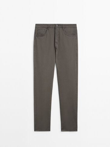 Pantaloni tipo denim in tricotine tapered fit
