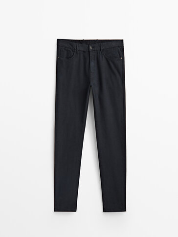 Tapered fit textured jeans