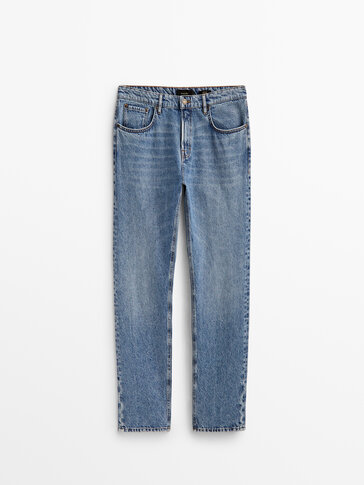 Mid-waist tapered-fit stonewashed jeans