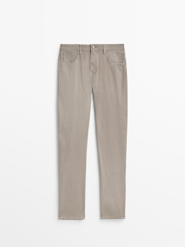 Slim-fit textured denim-effect trousers