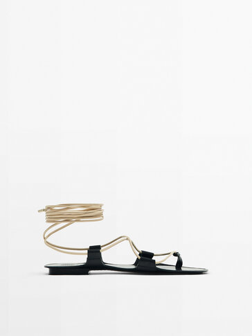 LEATHER FLAT TIED SANDALS - LIMITED EDITION