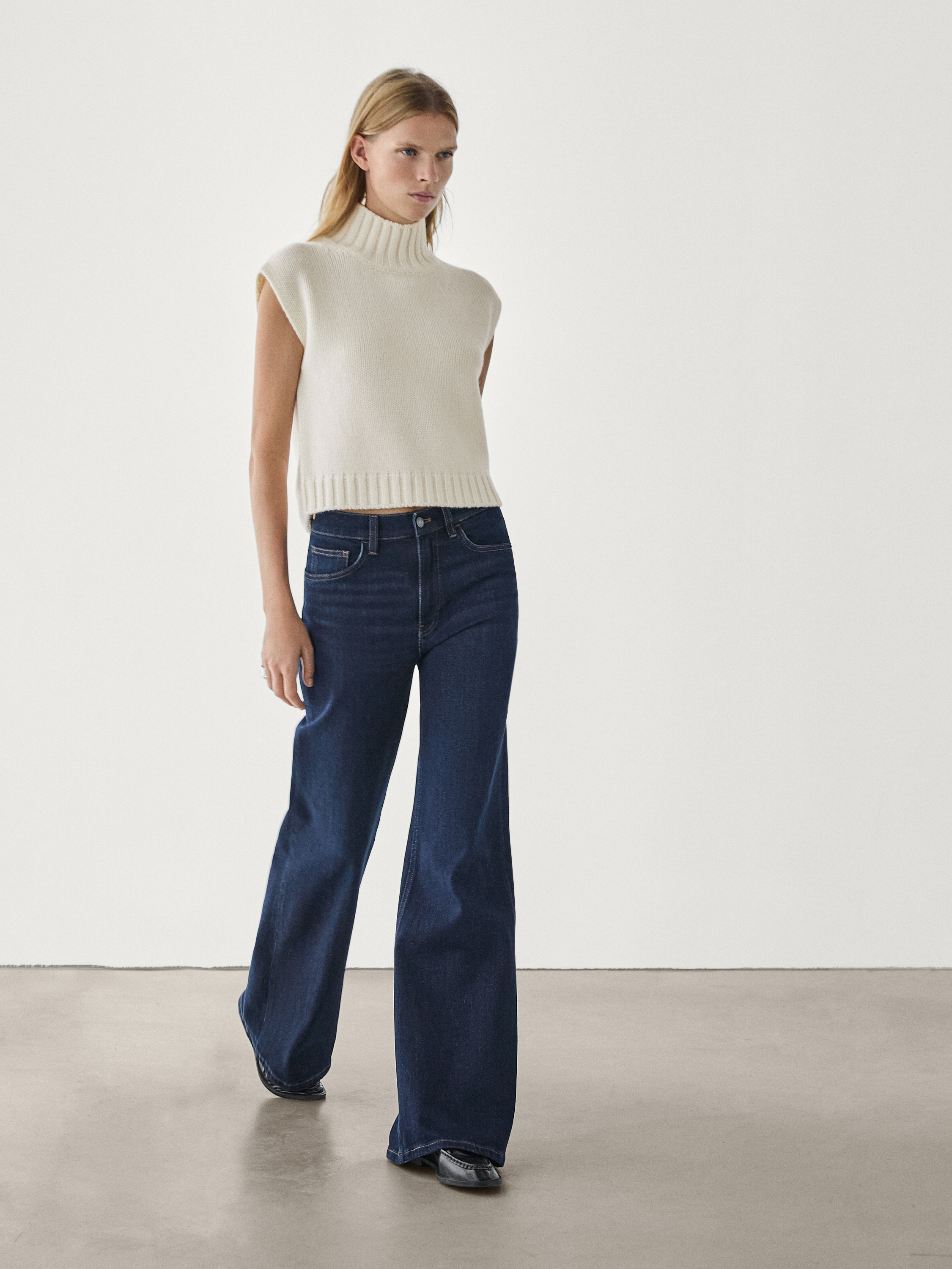 High rise flare fit cotton blend jeans