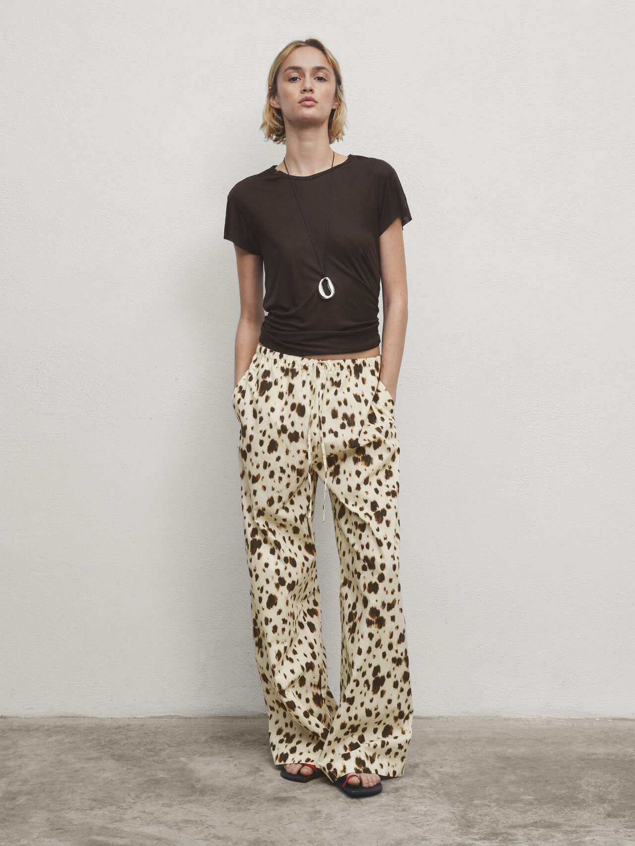 Wide-leg printed trousers with drawstring detail