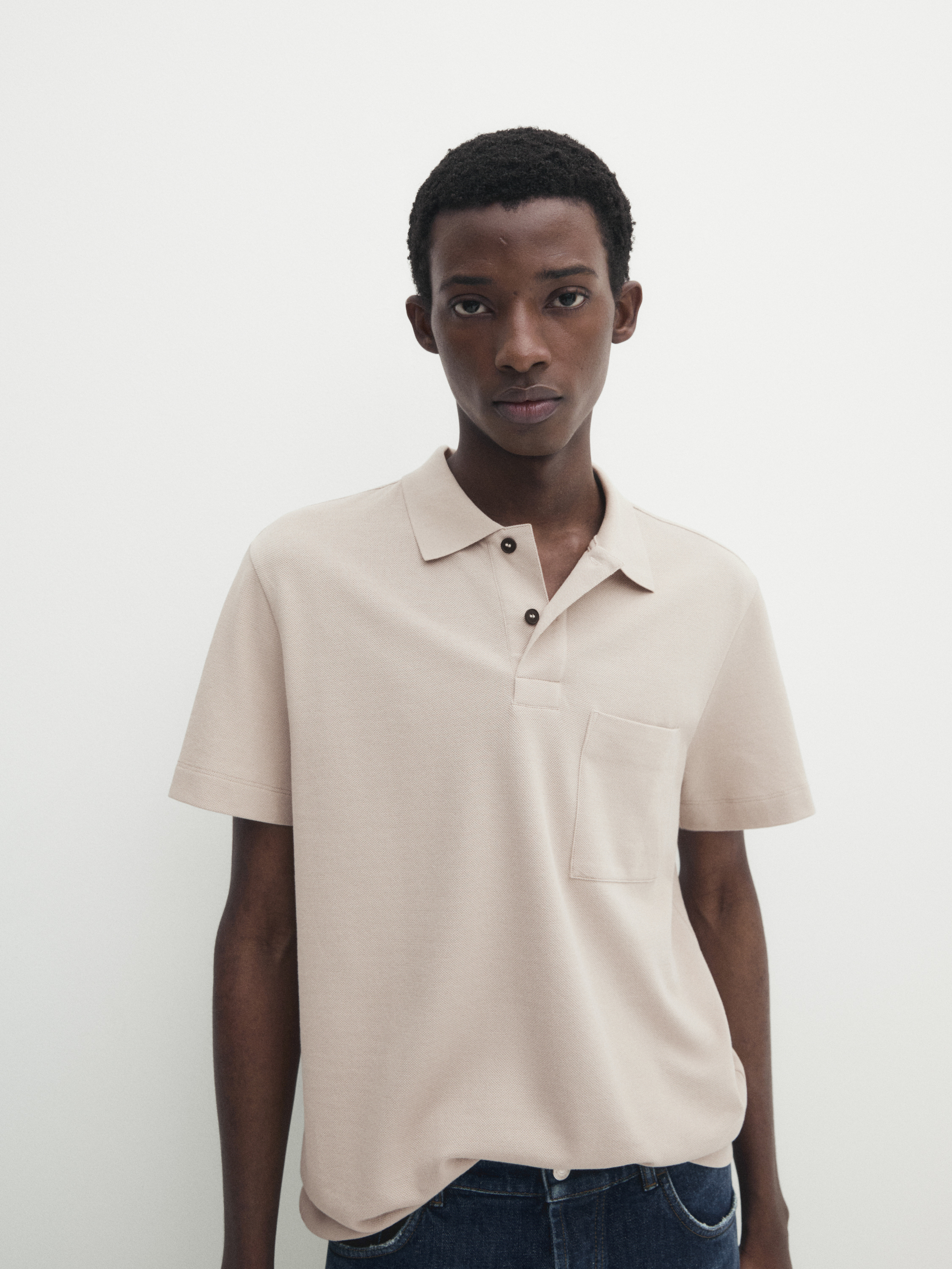 Textured cotton polo shirt with pocket detail_9