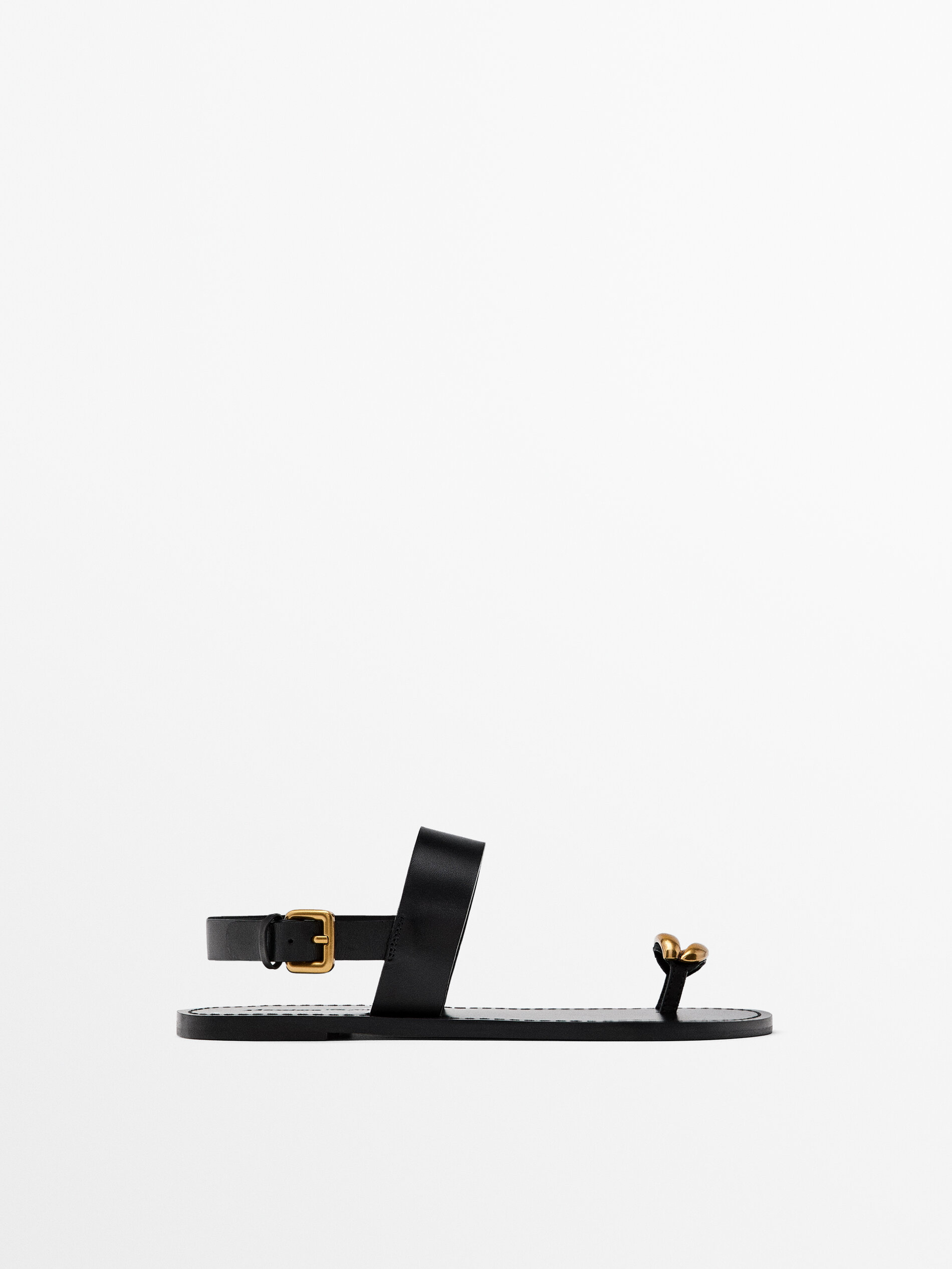 Flat sandals with metallic embellishment · Black · Flat Sandals