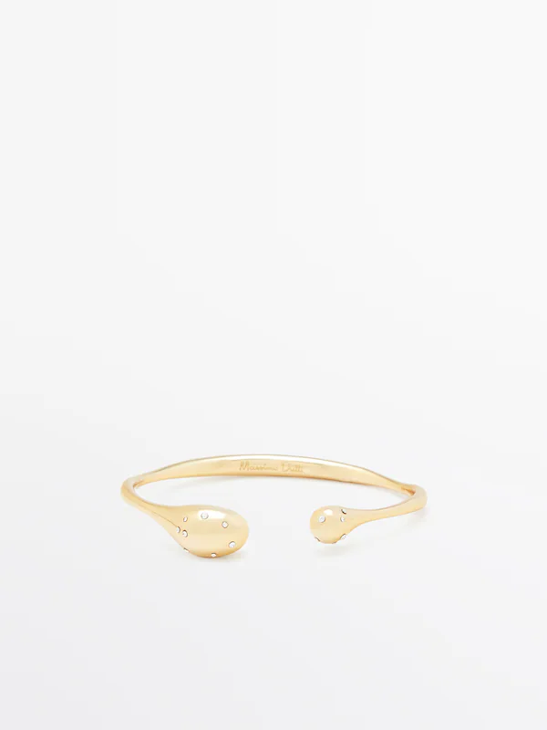 Rigid bracelet with rhinestone-encrusted droplets · Golden ...
