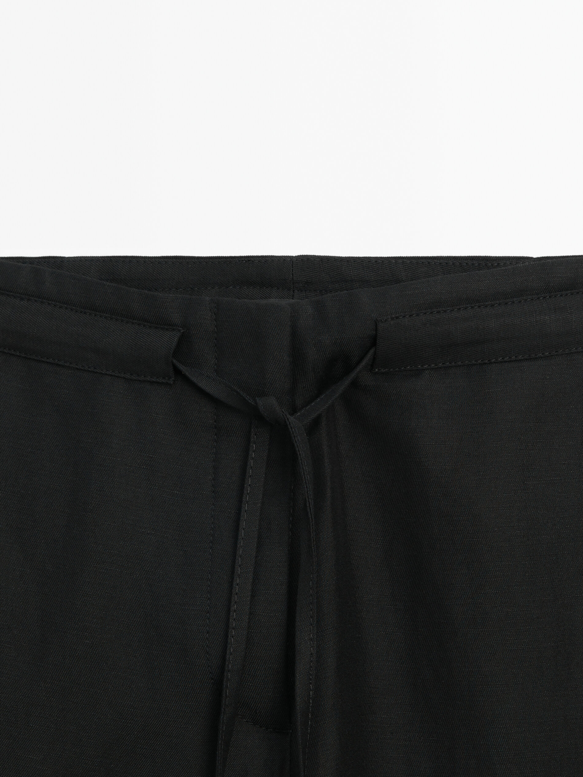Pantalón negro cordones conjunto