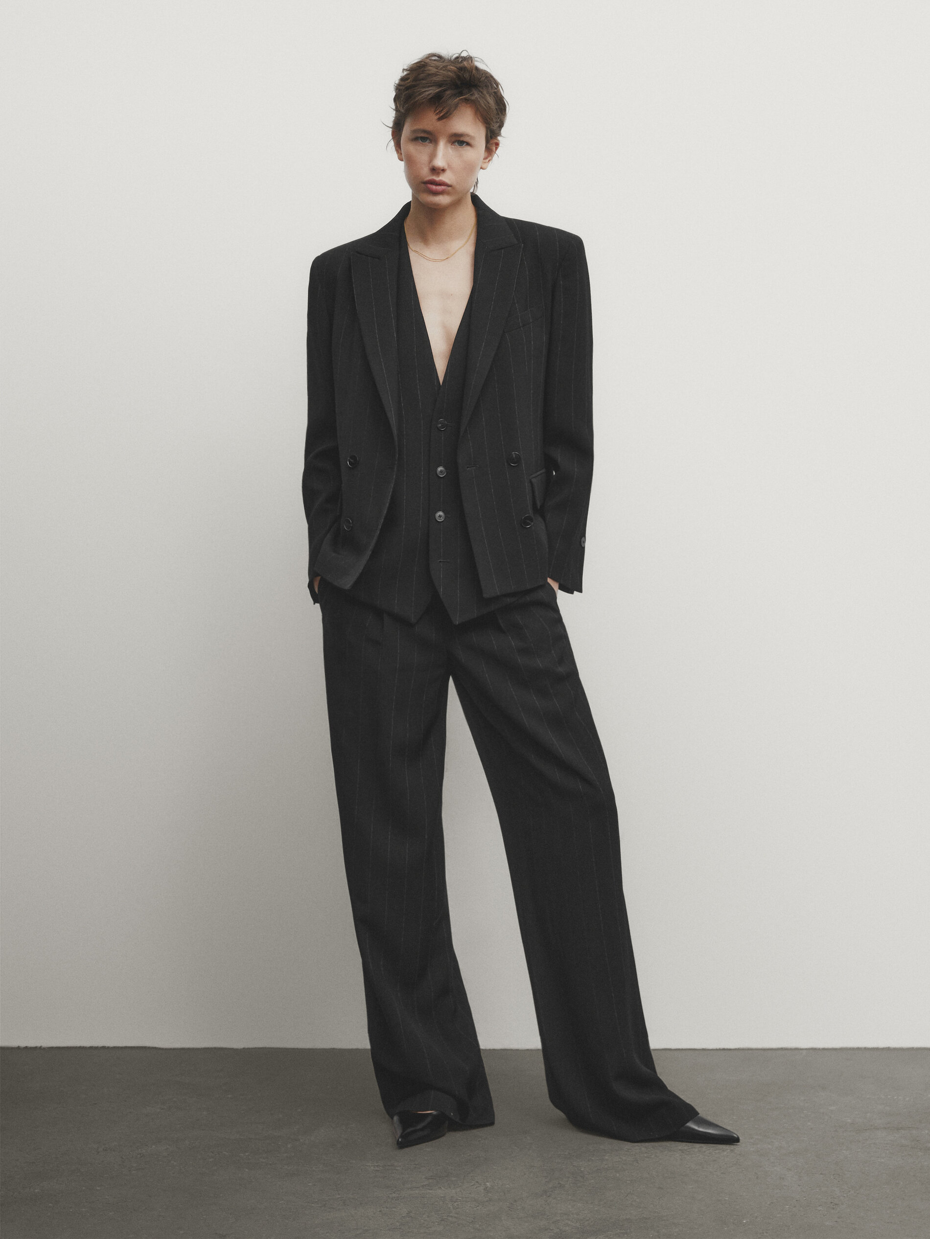 Pinstriped darted suit trousers
