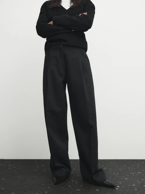 Full length darted black trousers
