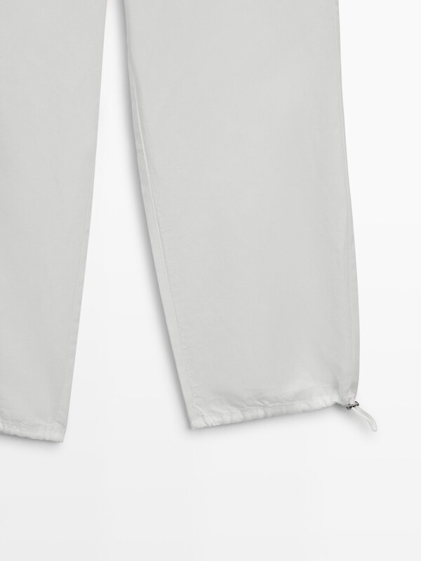 Trousers with elastic waistband and adjustable hem · White · Dressy ...