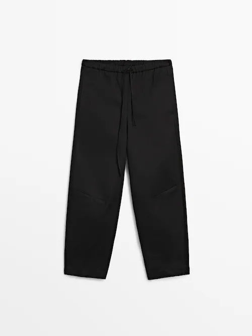 Black trousers with an elastic waist
