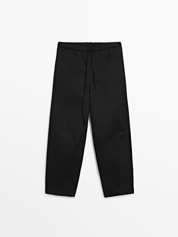 Black trousers with an elastic waist · Black · Dressy