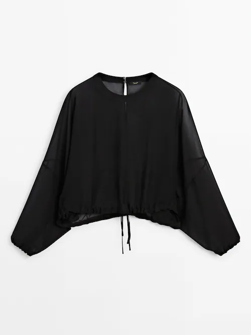 Semi-sheer blouse with tie detail · Black · Shirts