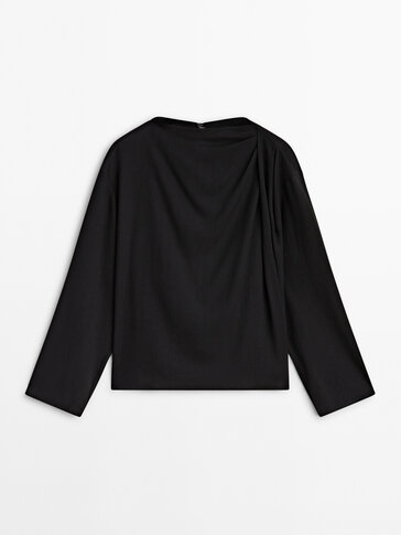 Long sleeve blouse with draped shoulder detail