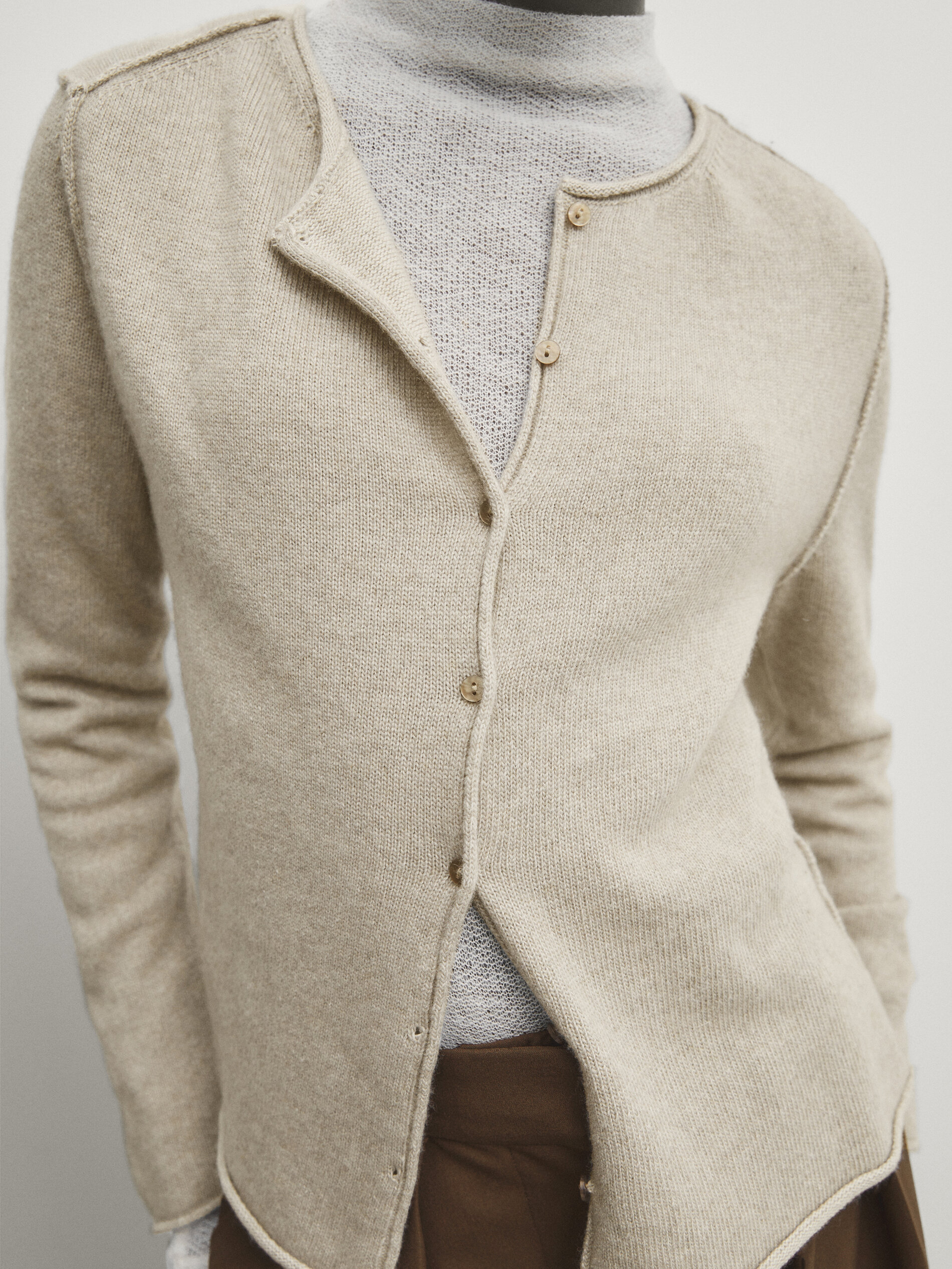 Buttoned knit cardigan with plated finish