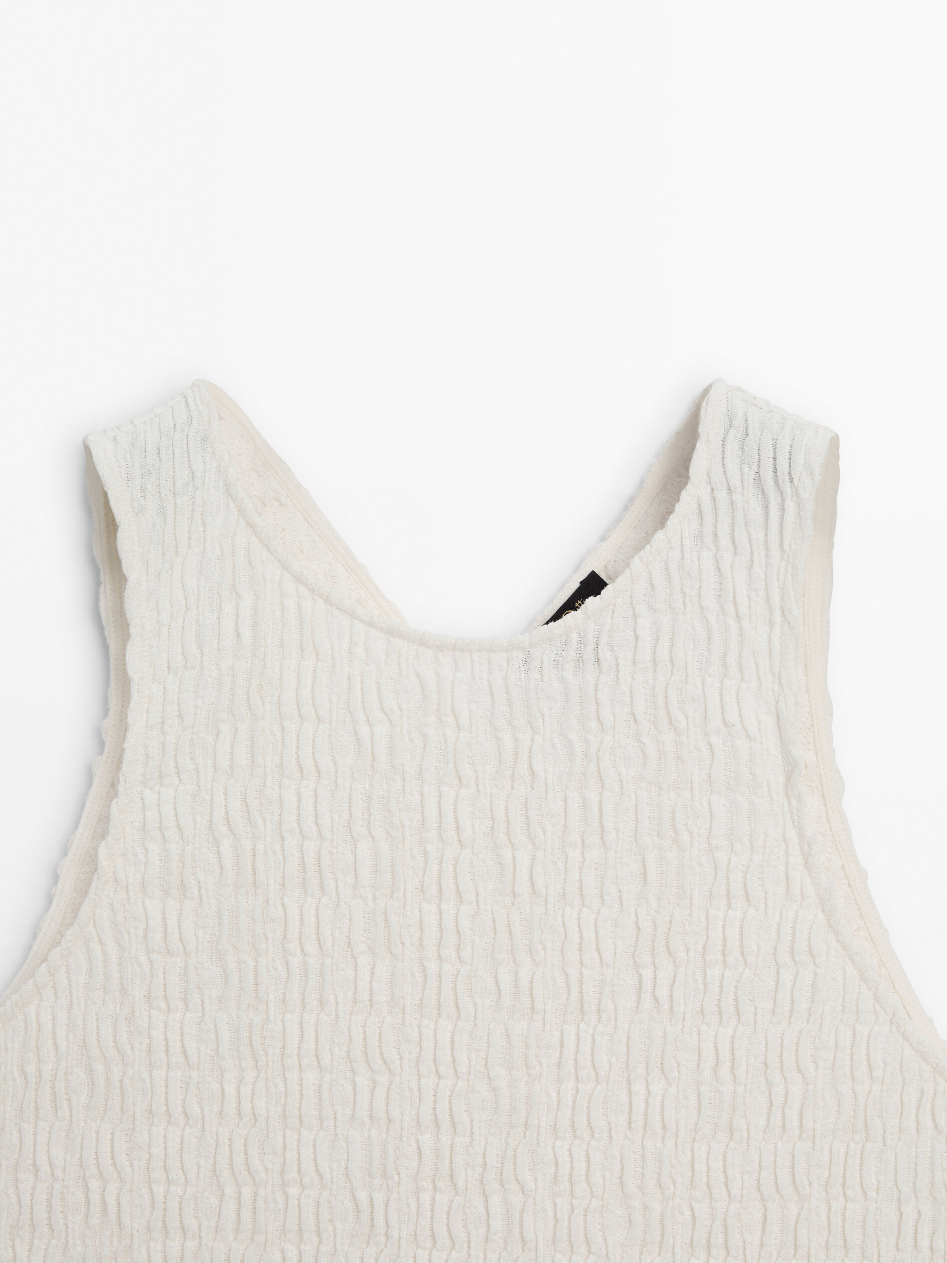 Sleeveless top with vent detail