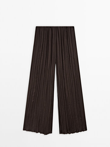 Wide-leg creased-effect trousers - Studio