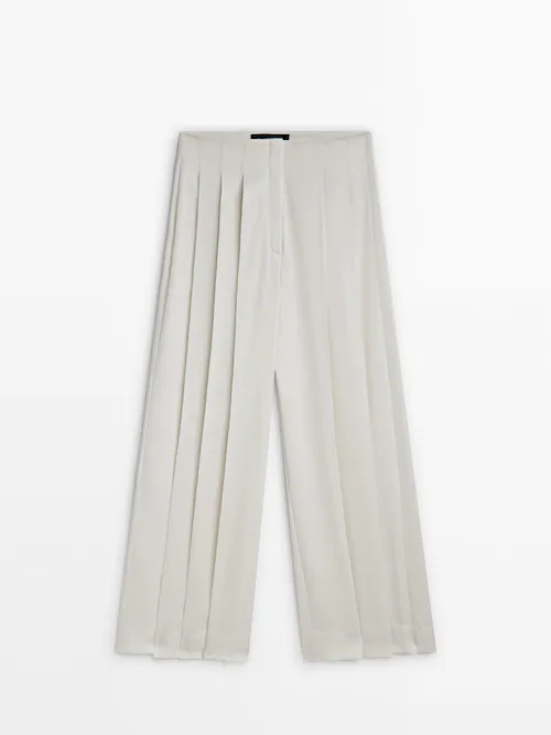 Pleated wide-leg trousers - Studio · Cream · Dressy
