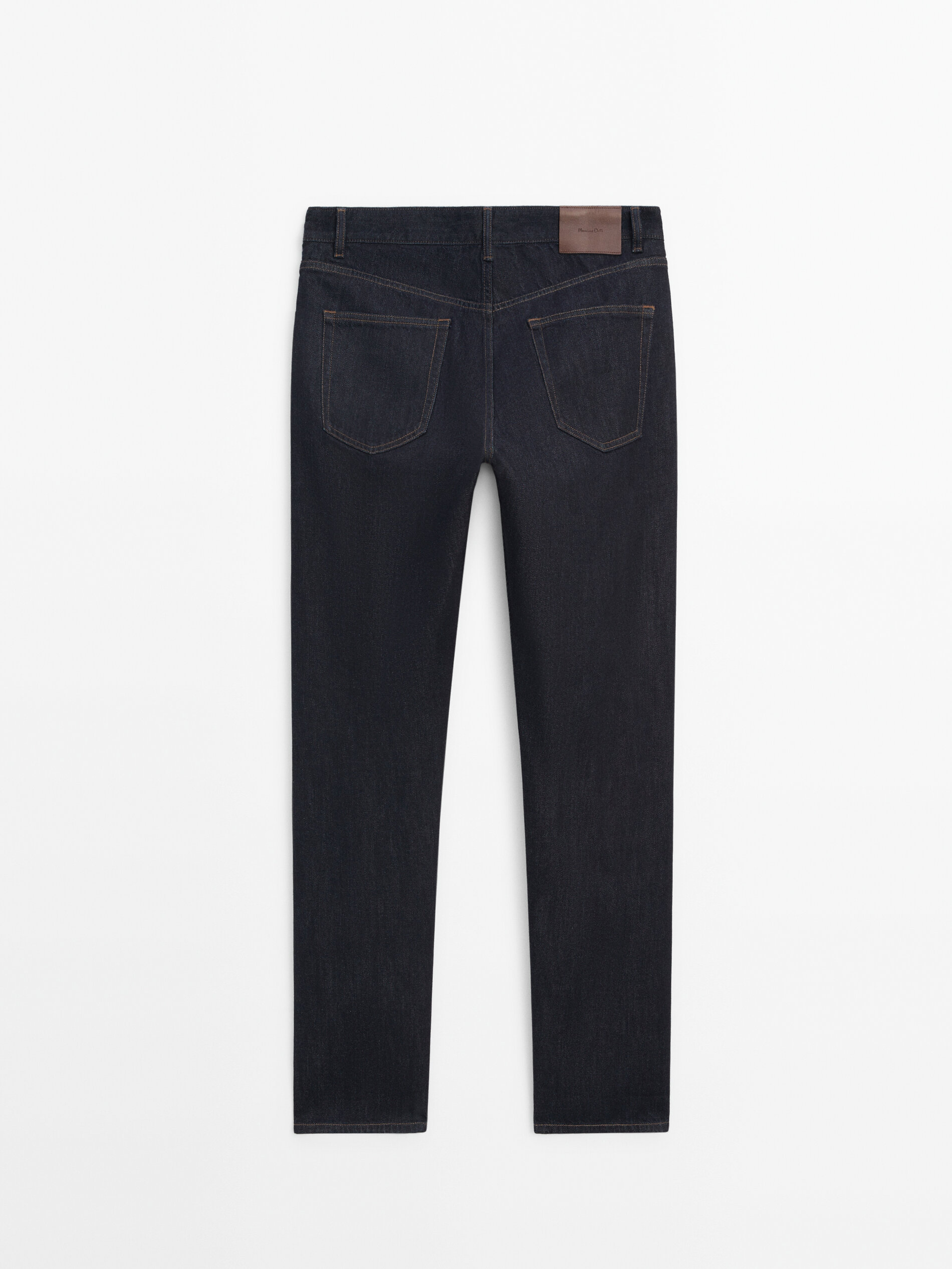 Jeans selvedge desencolado tapered fit