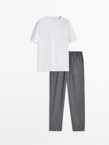 Striped pyjama bottoms and short sleeve T-shirt