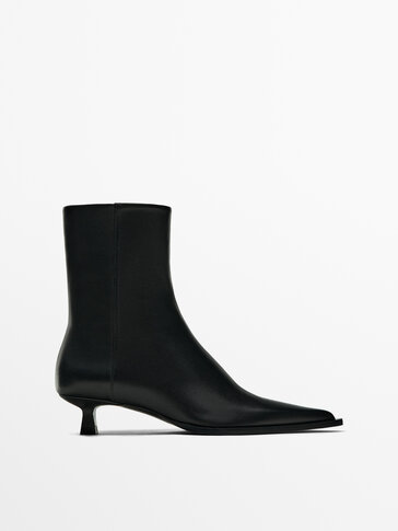 Heeled ankle boots with welt detail