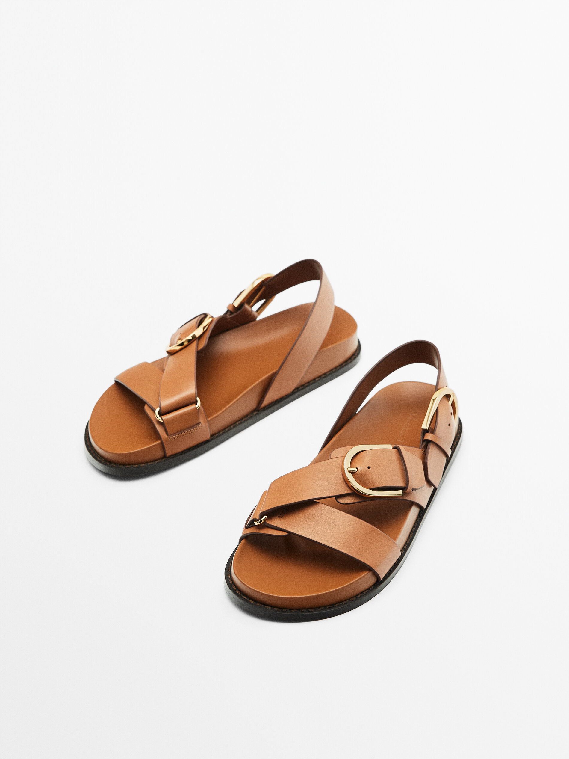 Criss cross sandals with buckles