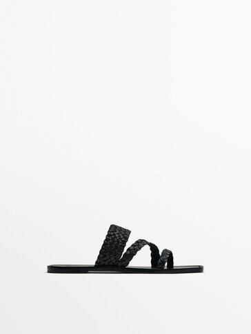 Flat slider sandals with woven straps