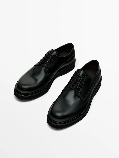 Black lace-up shoes