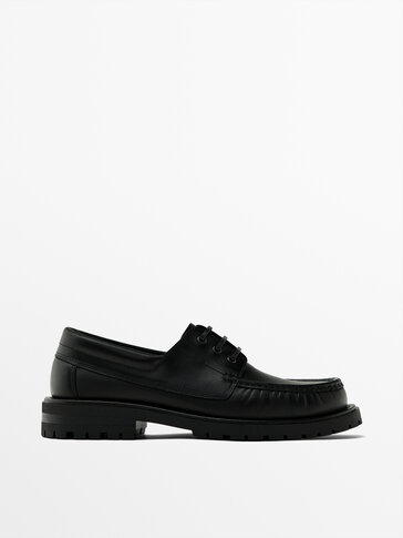 Chaussures bateau noires en cuir nappa