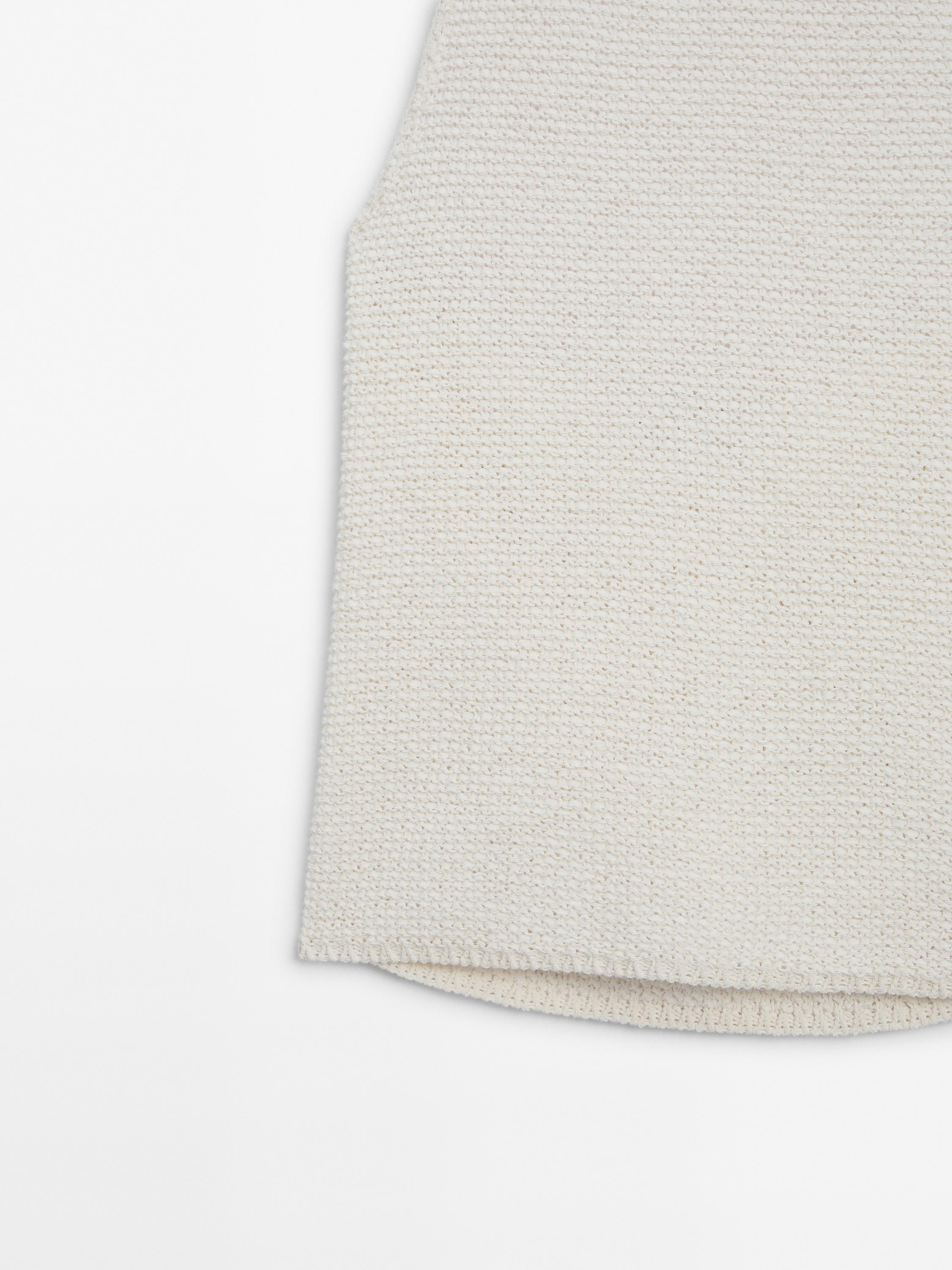 Halterneck top with low-cut back