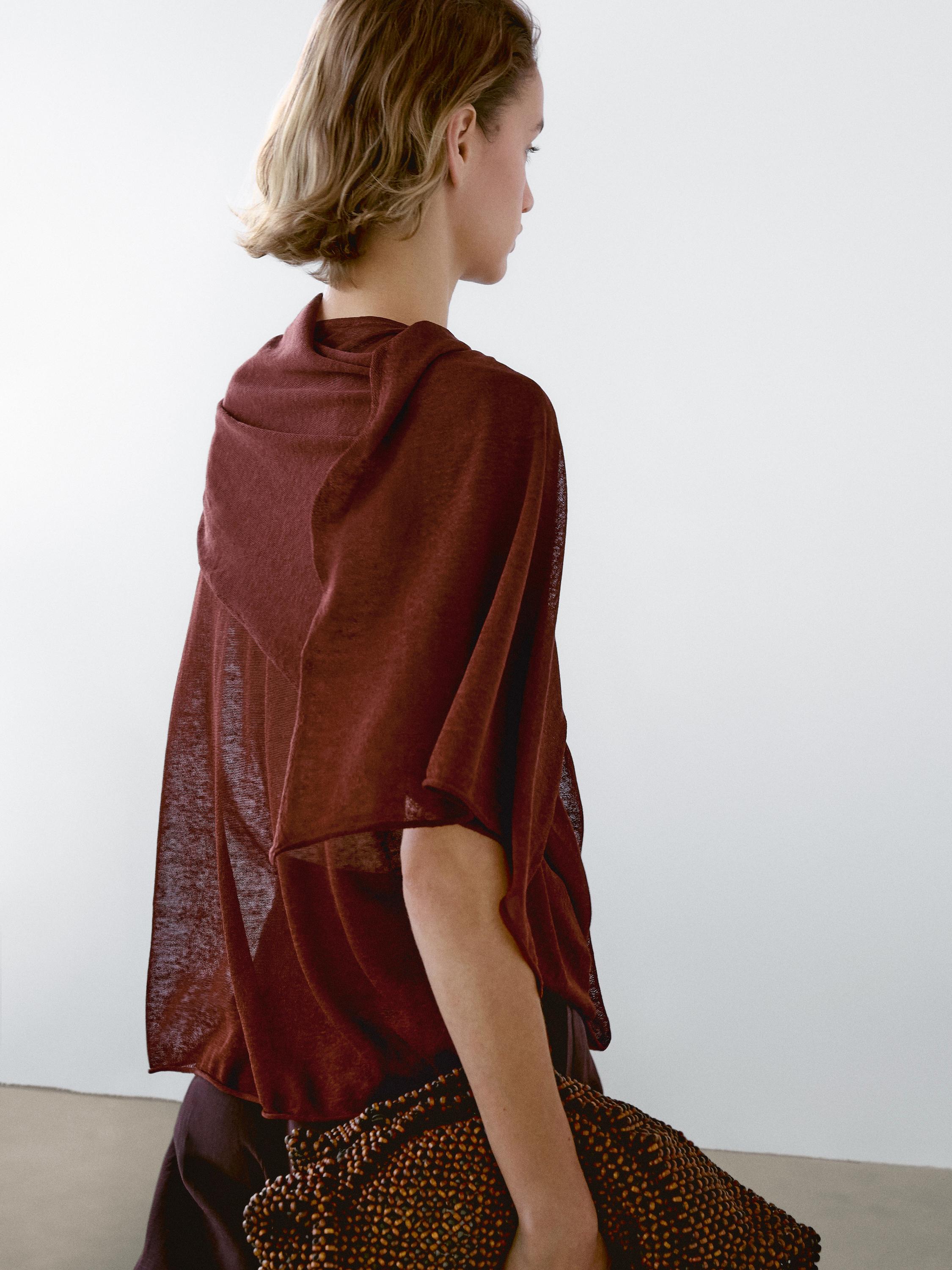 Flowing top with cape detail
