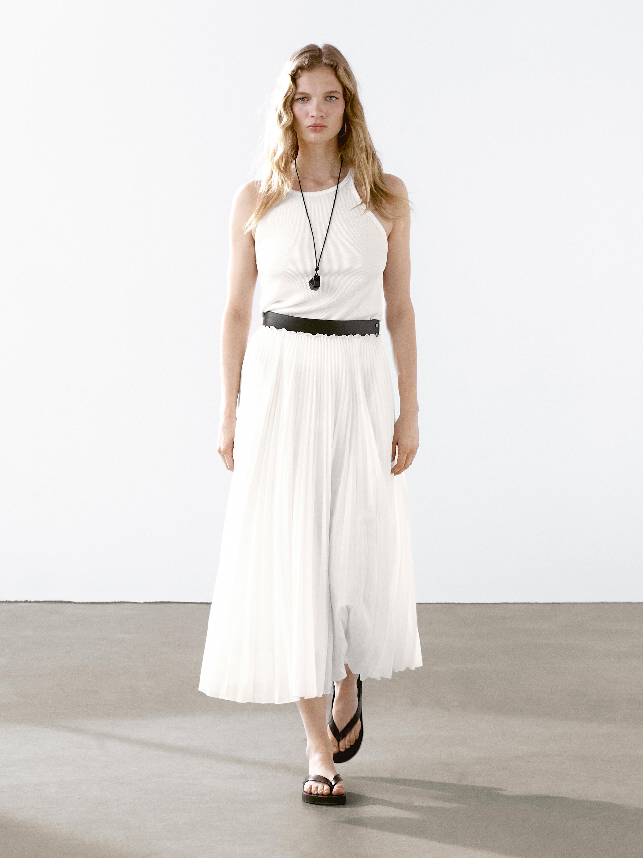 Jupe plissée avec détail en cuir