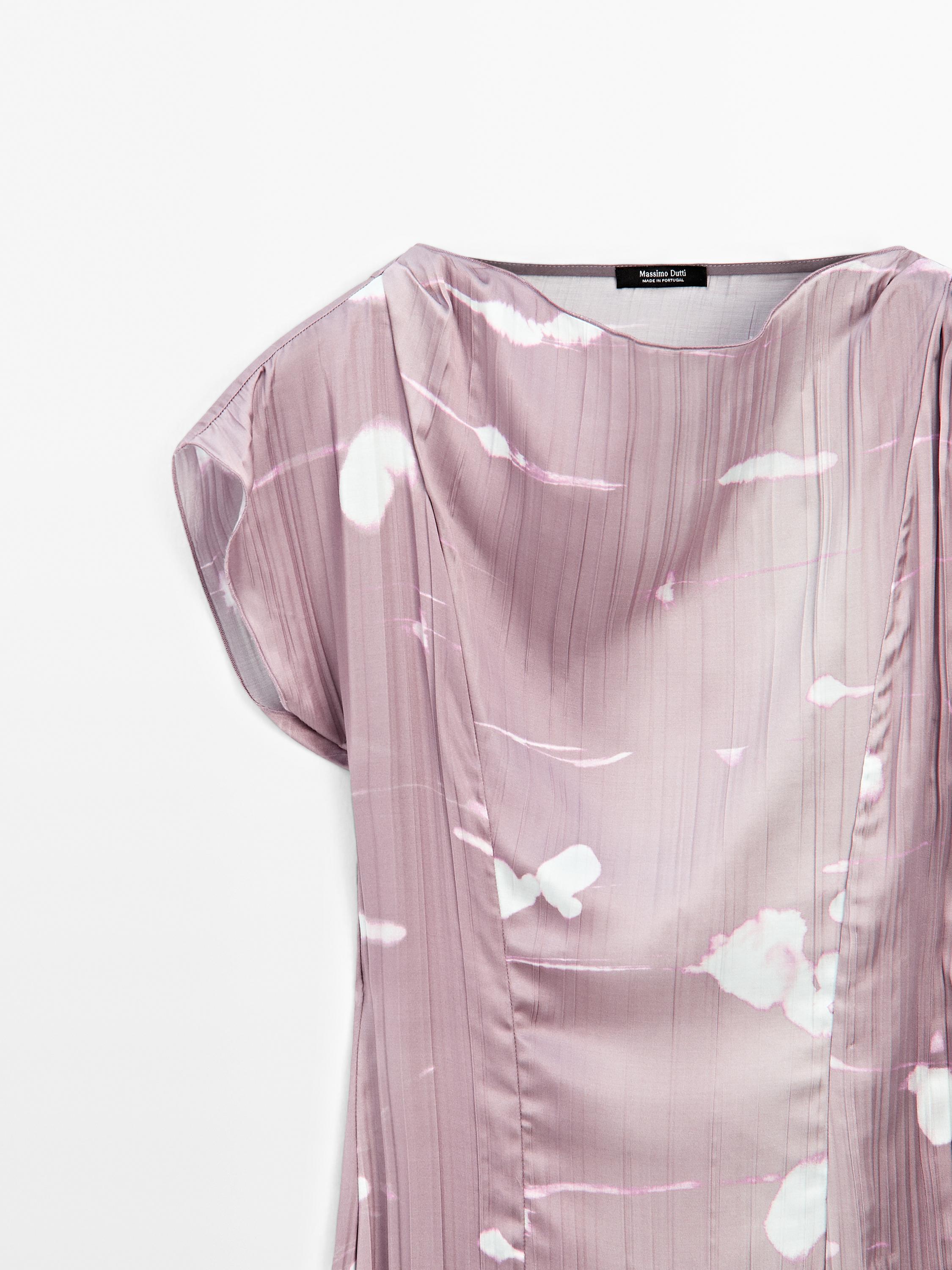 Long pleated dress in printed fabric