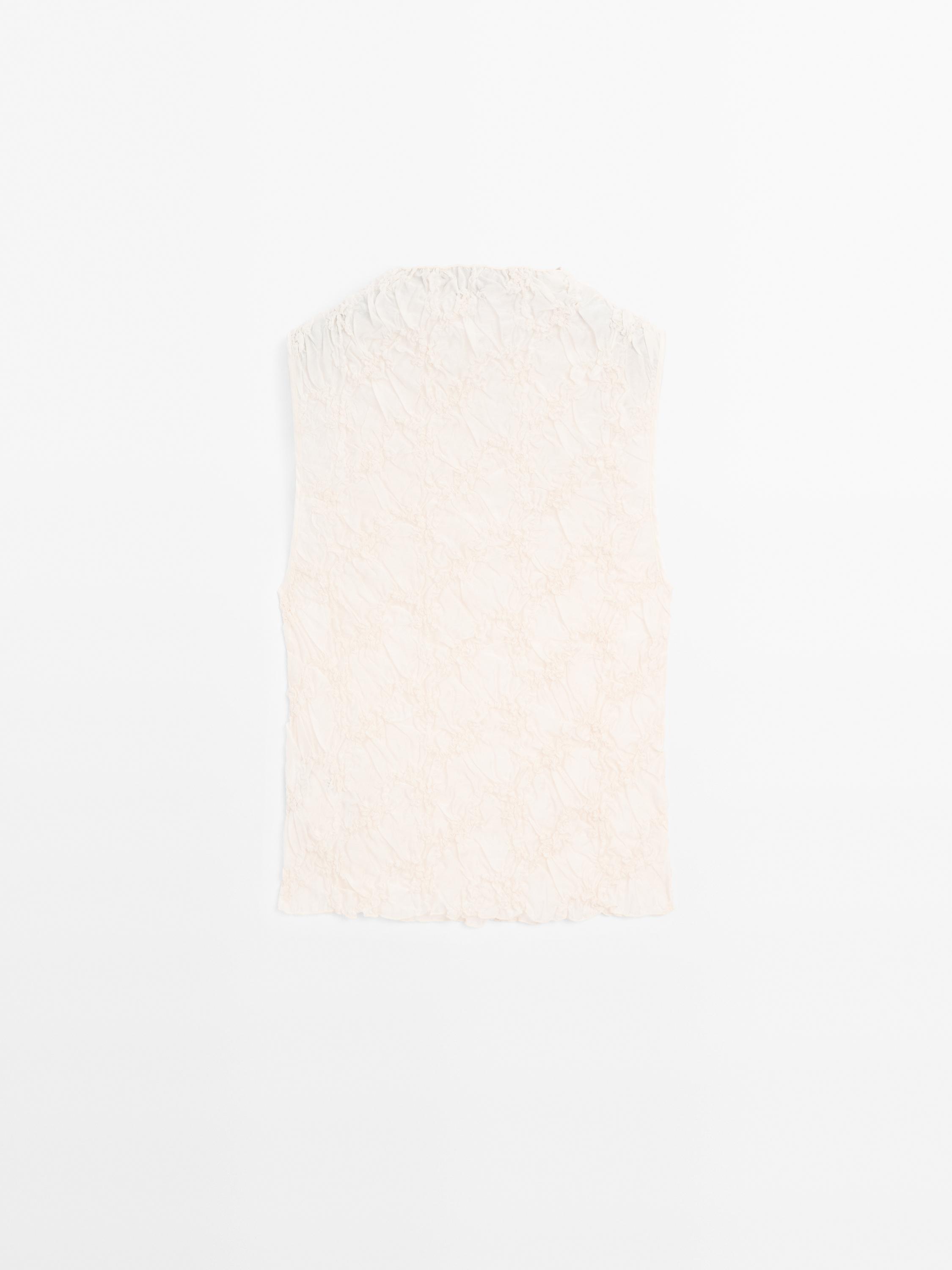 Creased-effect funnel neck top