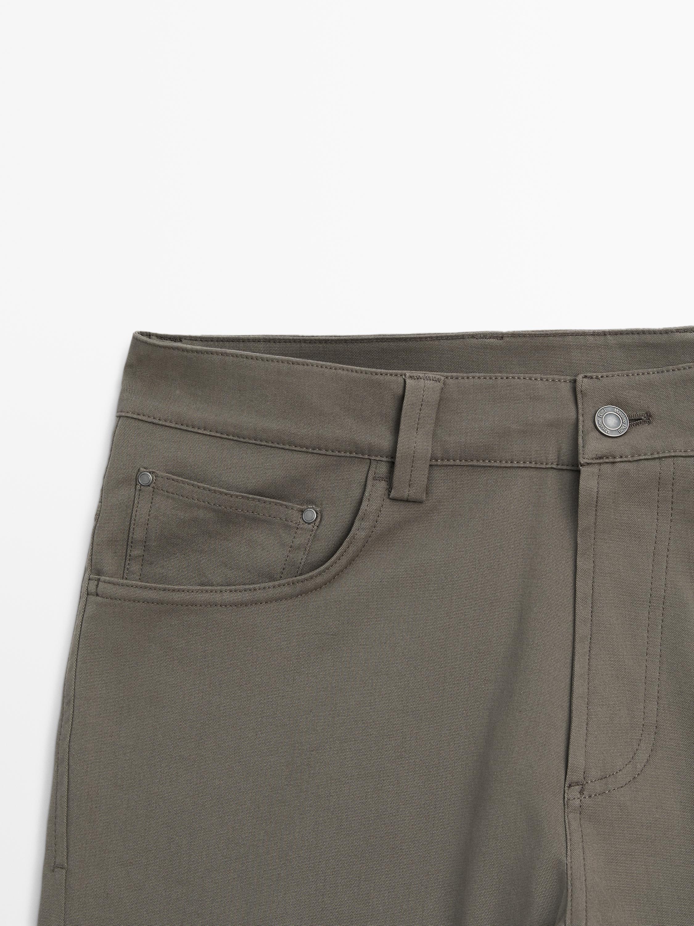 Cotton blend tapered fit jeans