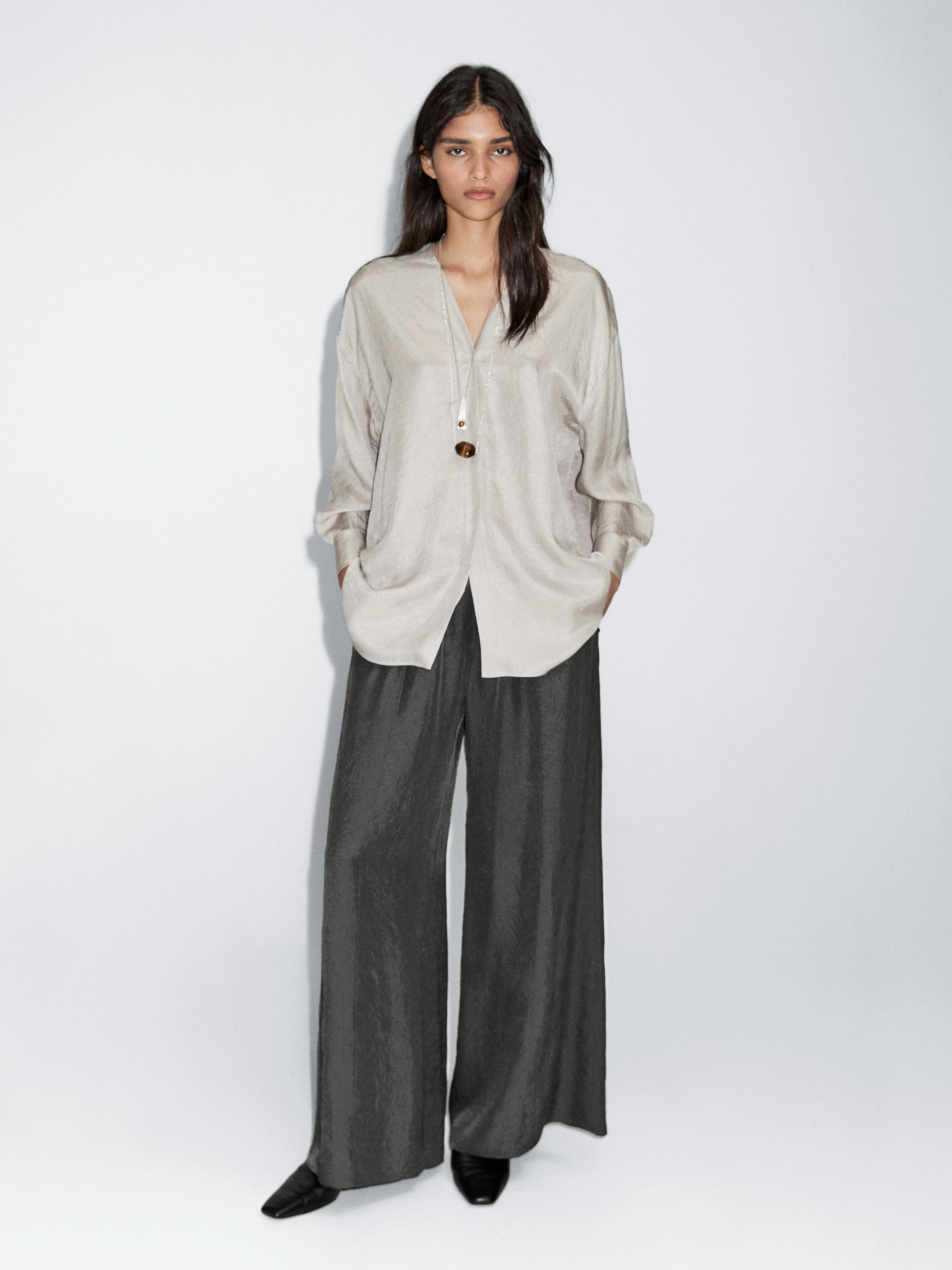 Flowing creased-effect trousers