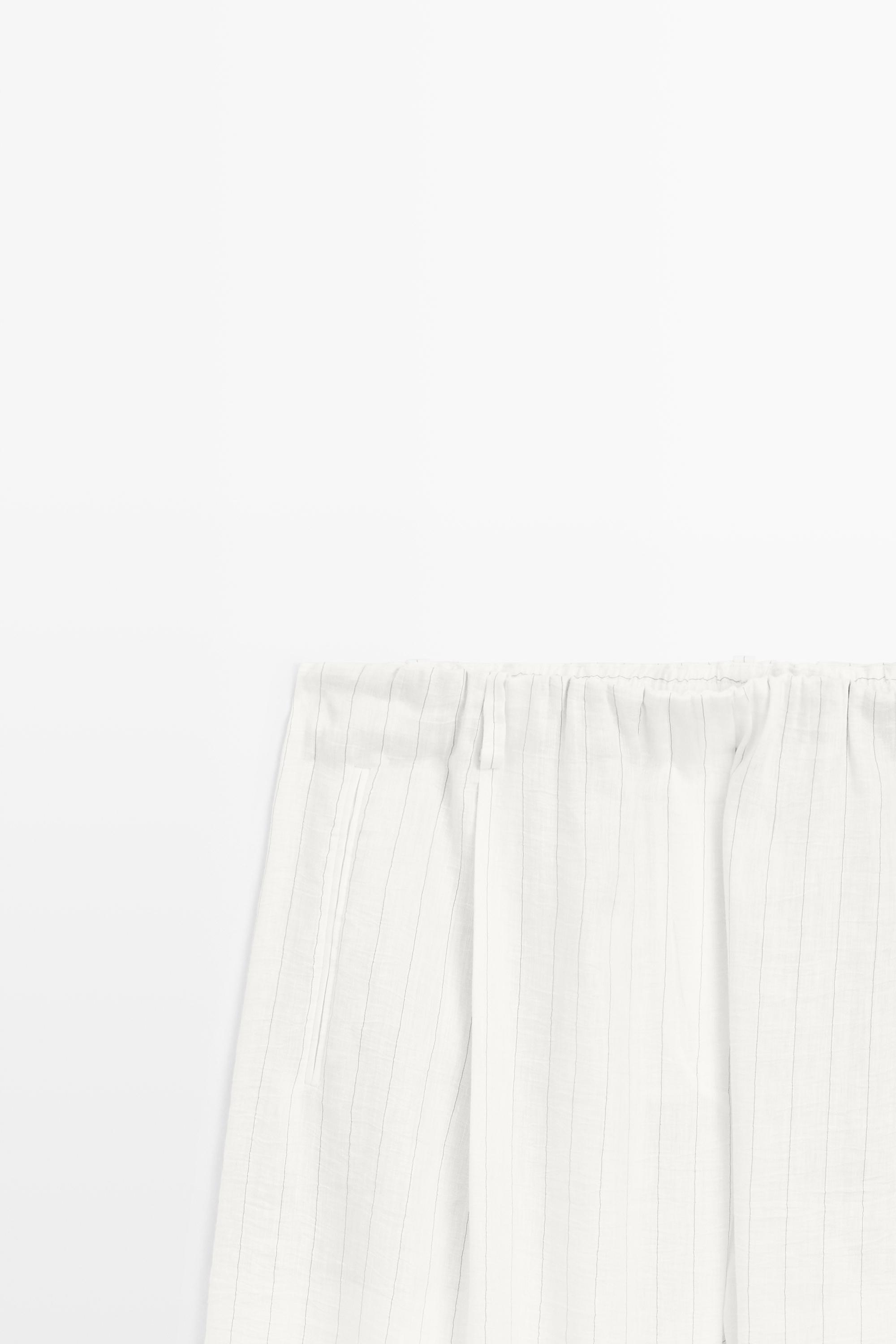 Striped pleated flowing pants - STUDIO — CREAM