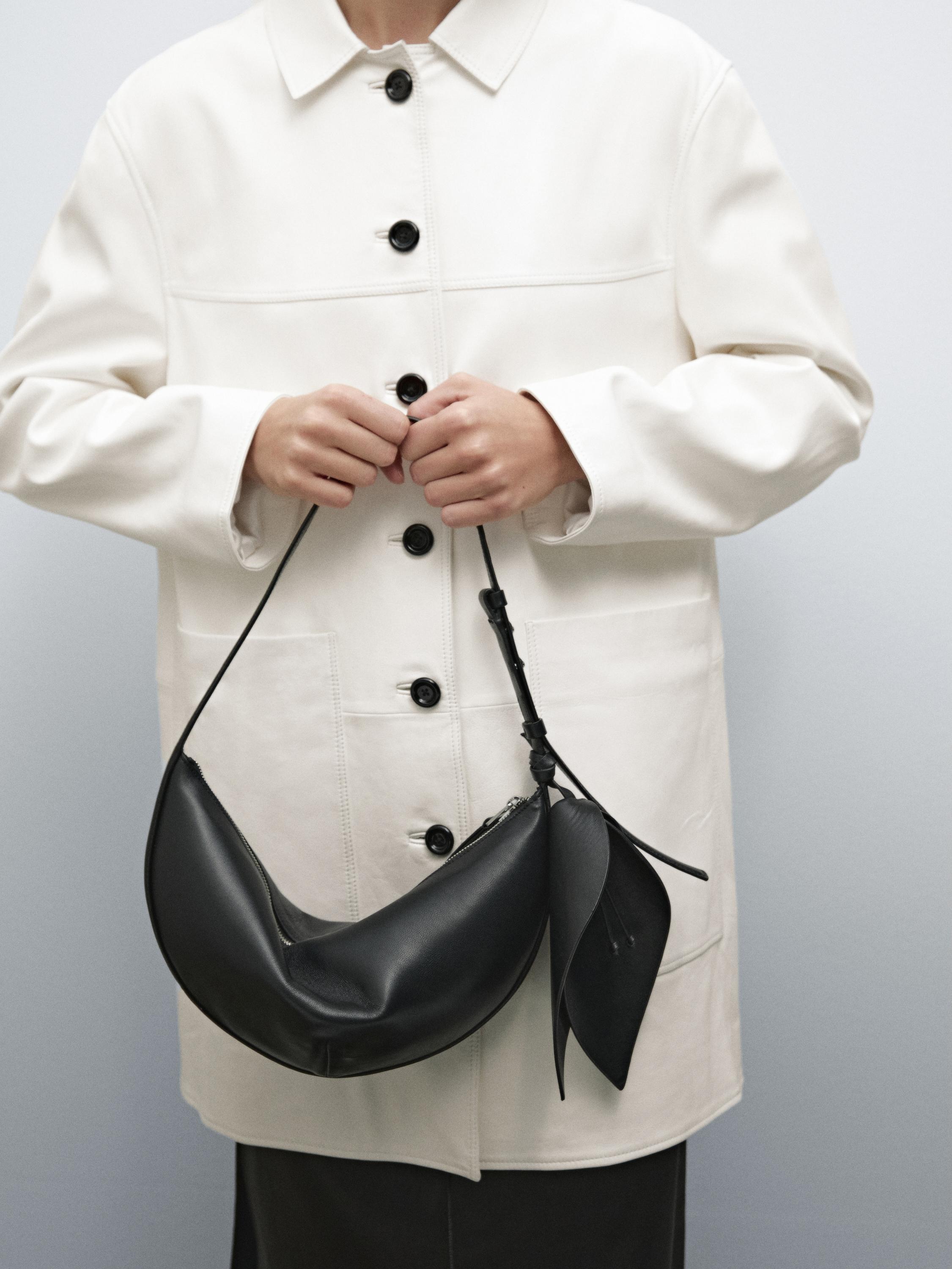 Nappa leather half-moon bag with flower detail