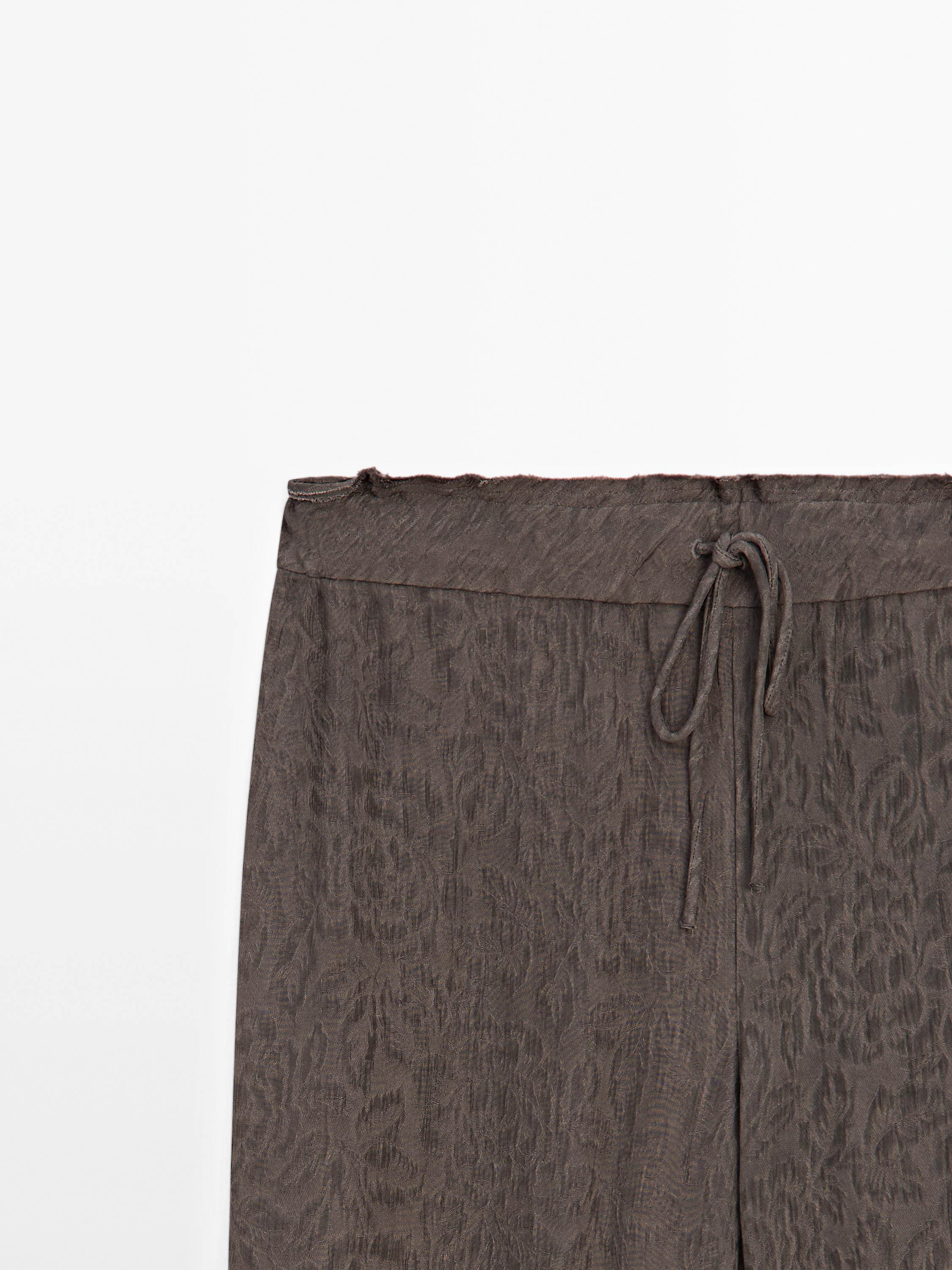 Flowing wide-leg jacquard trousers