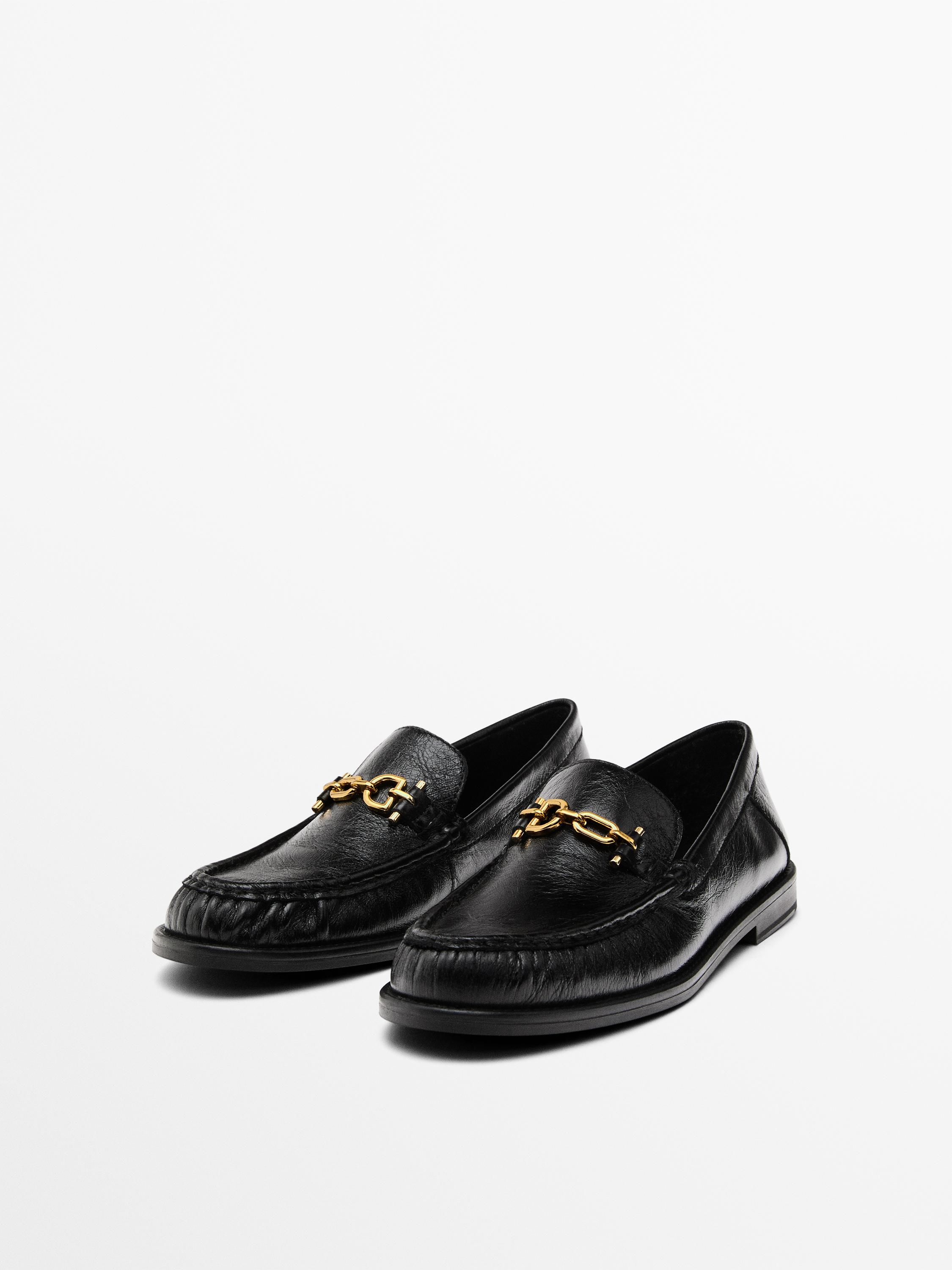 Crackled leather loafers with decorative detail