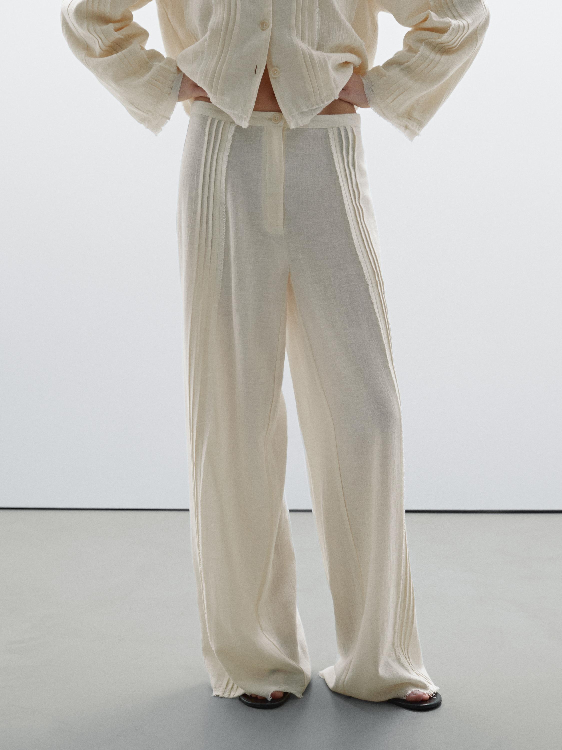 Pantalon avec broderies en coton mélangé