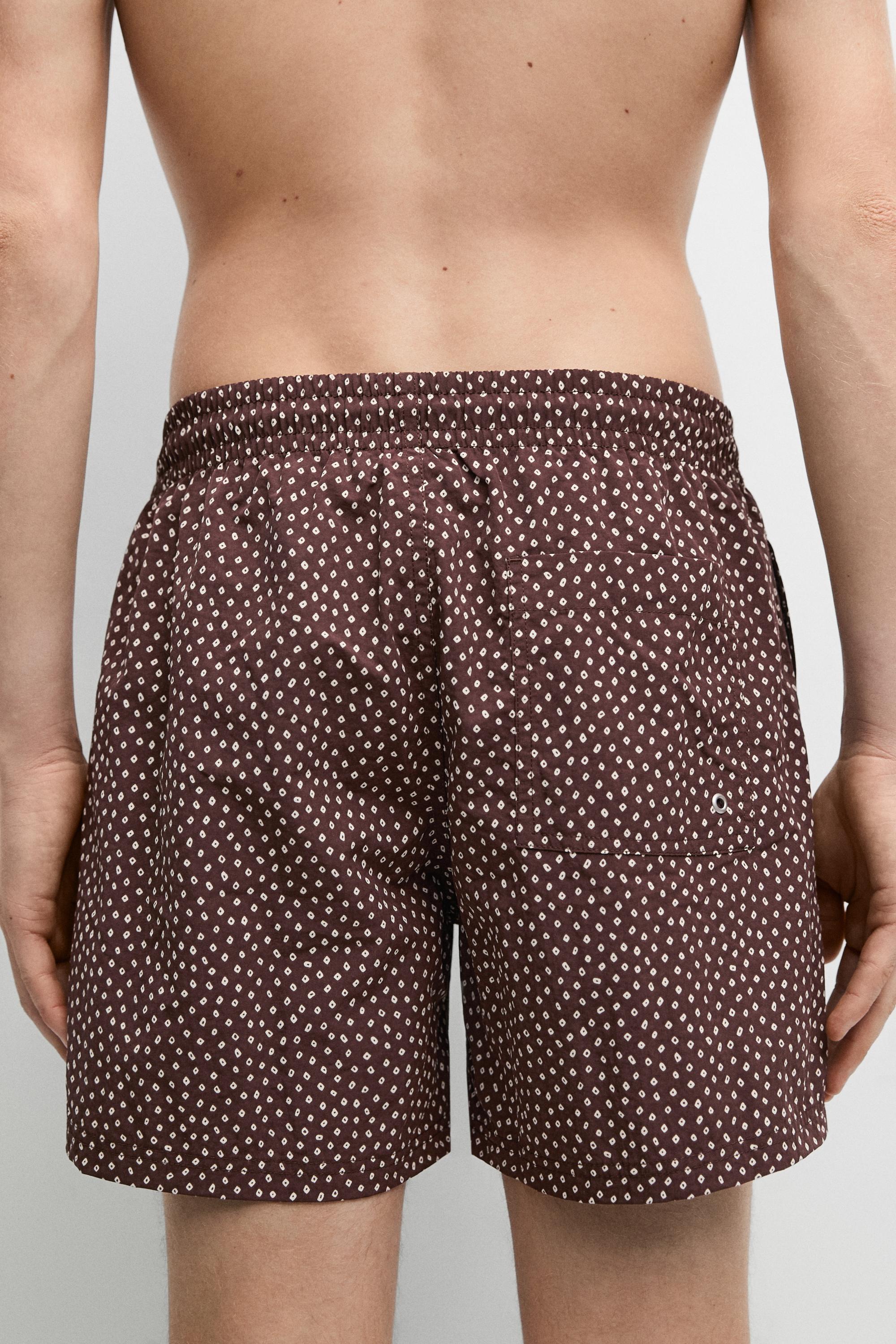 Badeshorts mit Tupfenprint