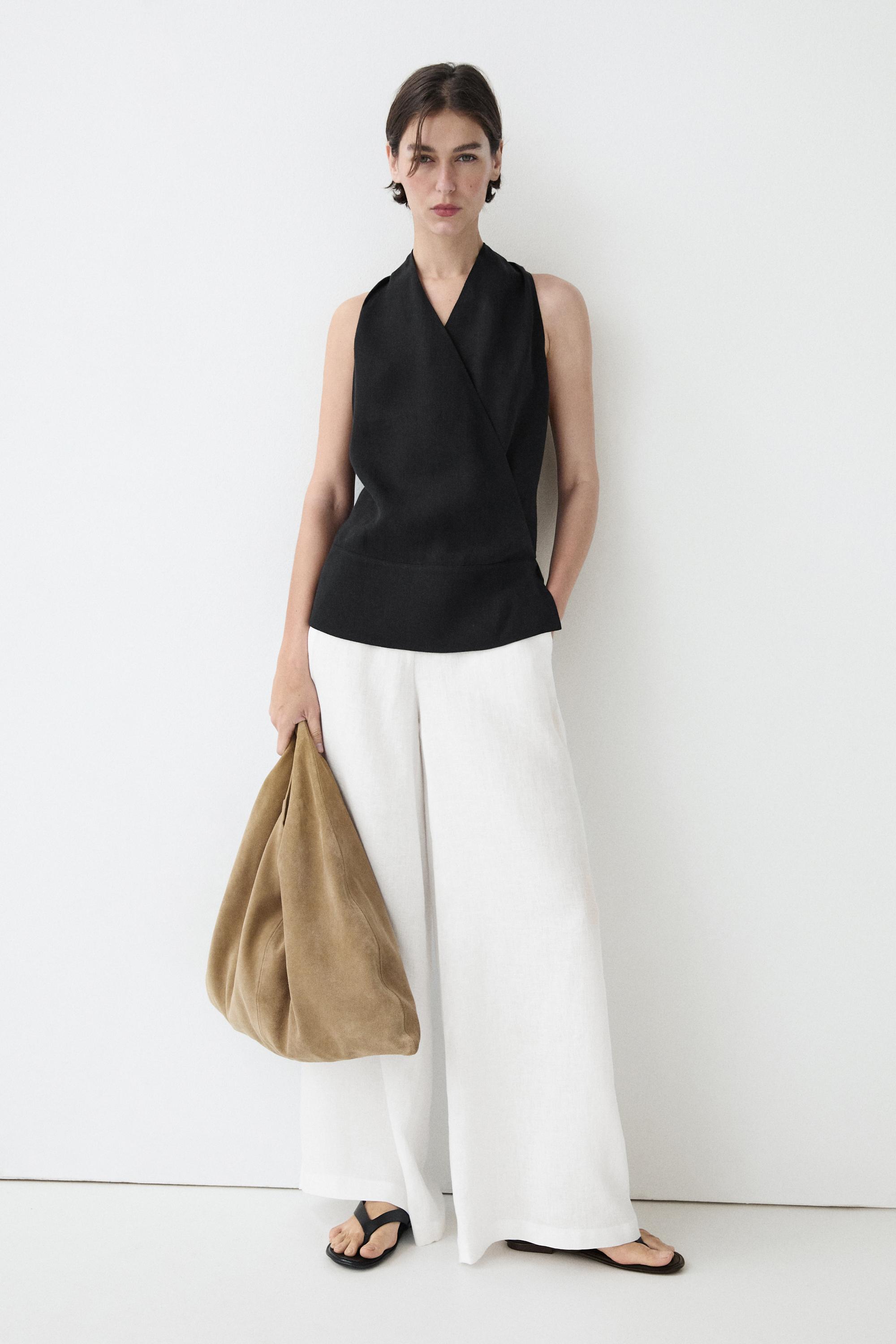 Draped surplice top with corset belt detail · Black · Shirts