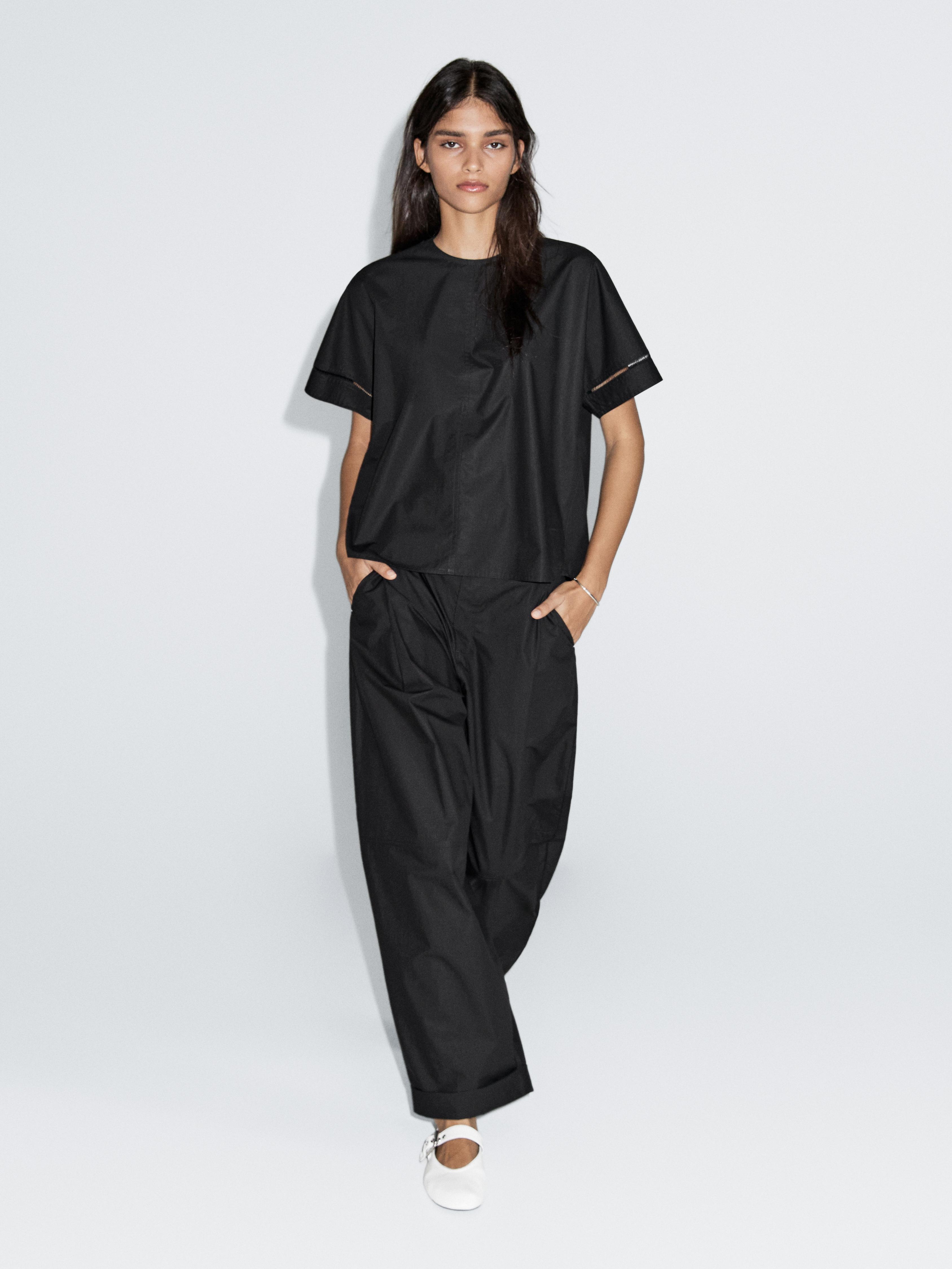 Blusa holgada detalle manga