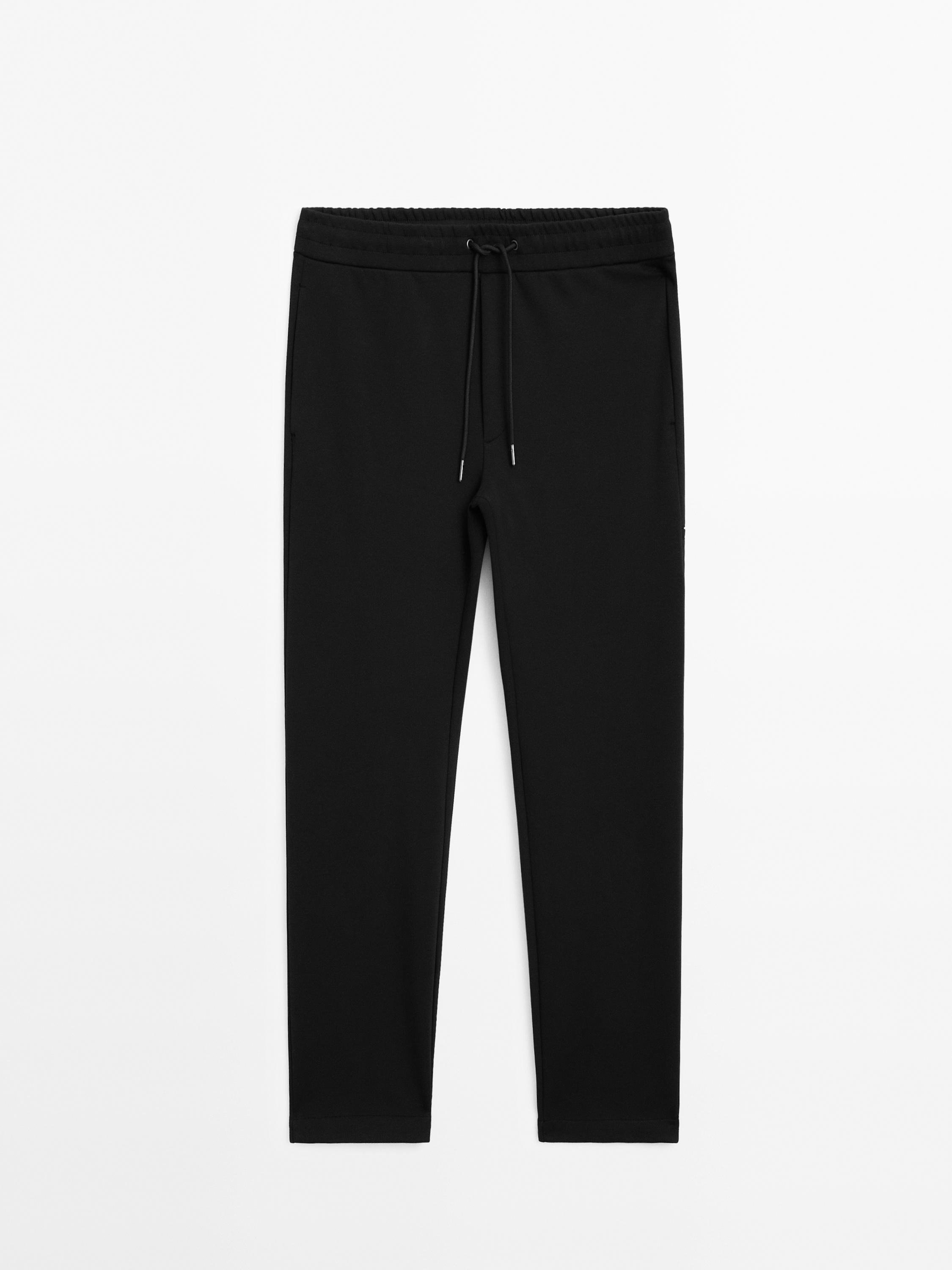 Trousers with side pocket detail
