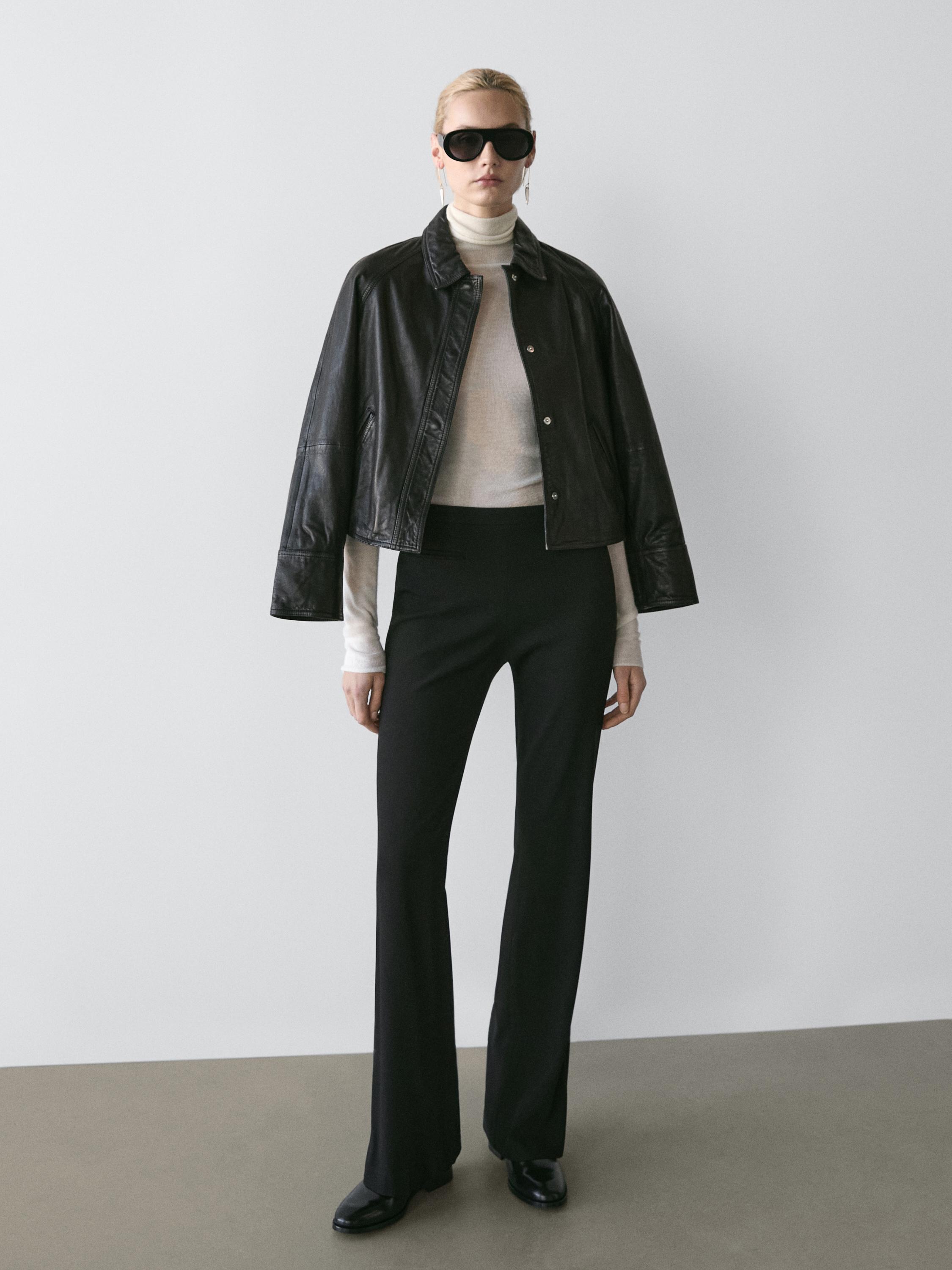 Flared trousers with pocket — BLACK