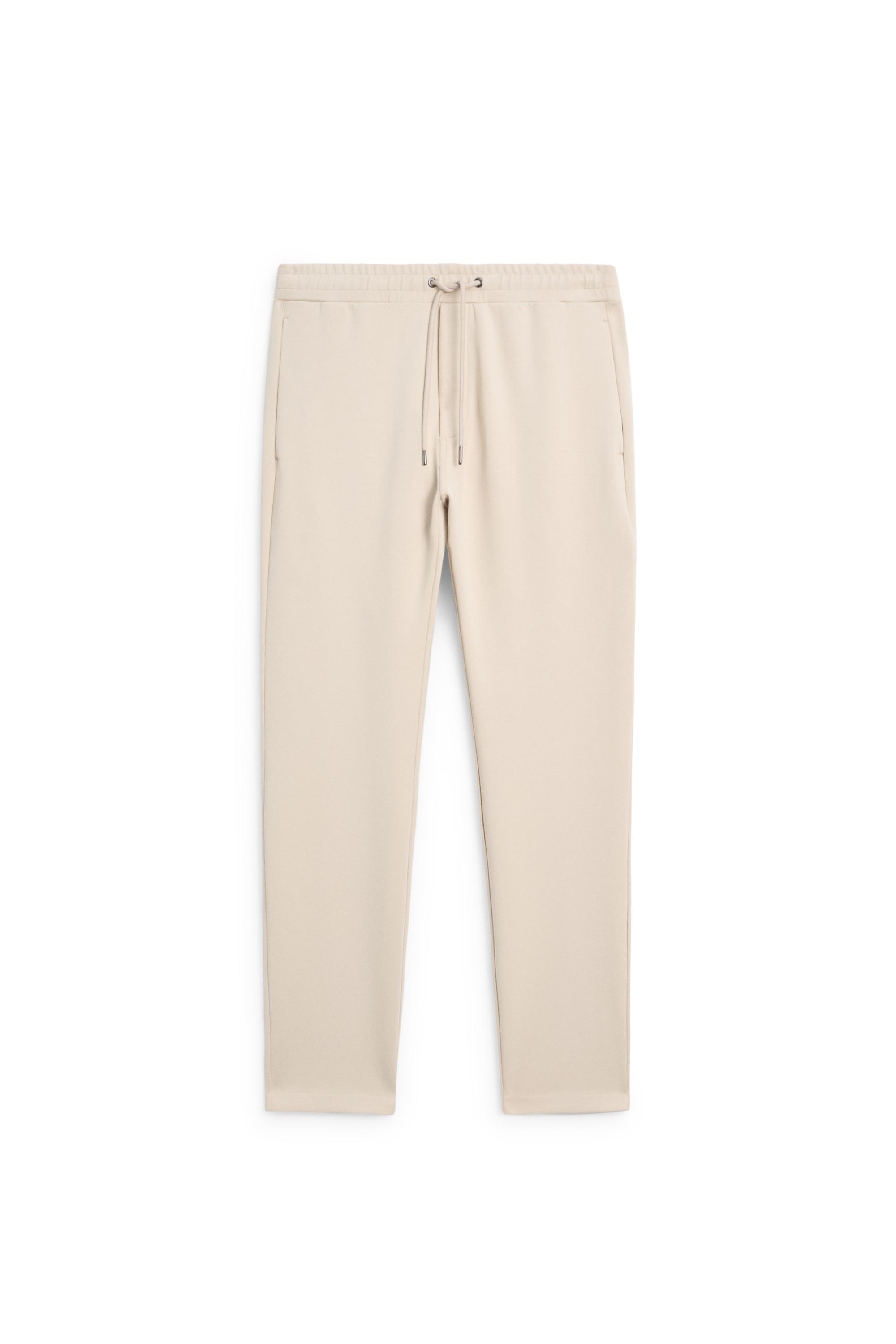 Total look cotton blend jogger fit trousers — Light Beige