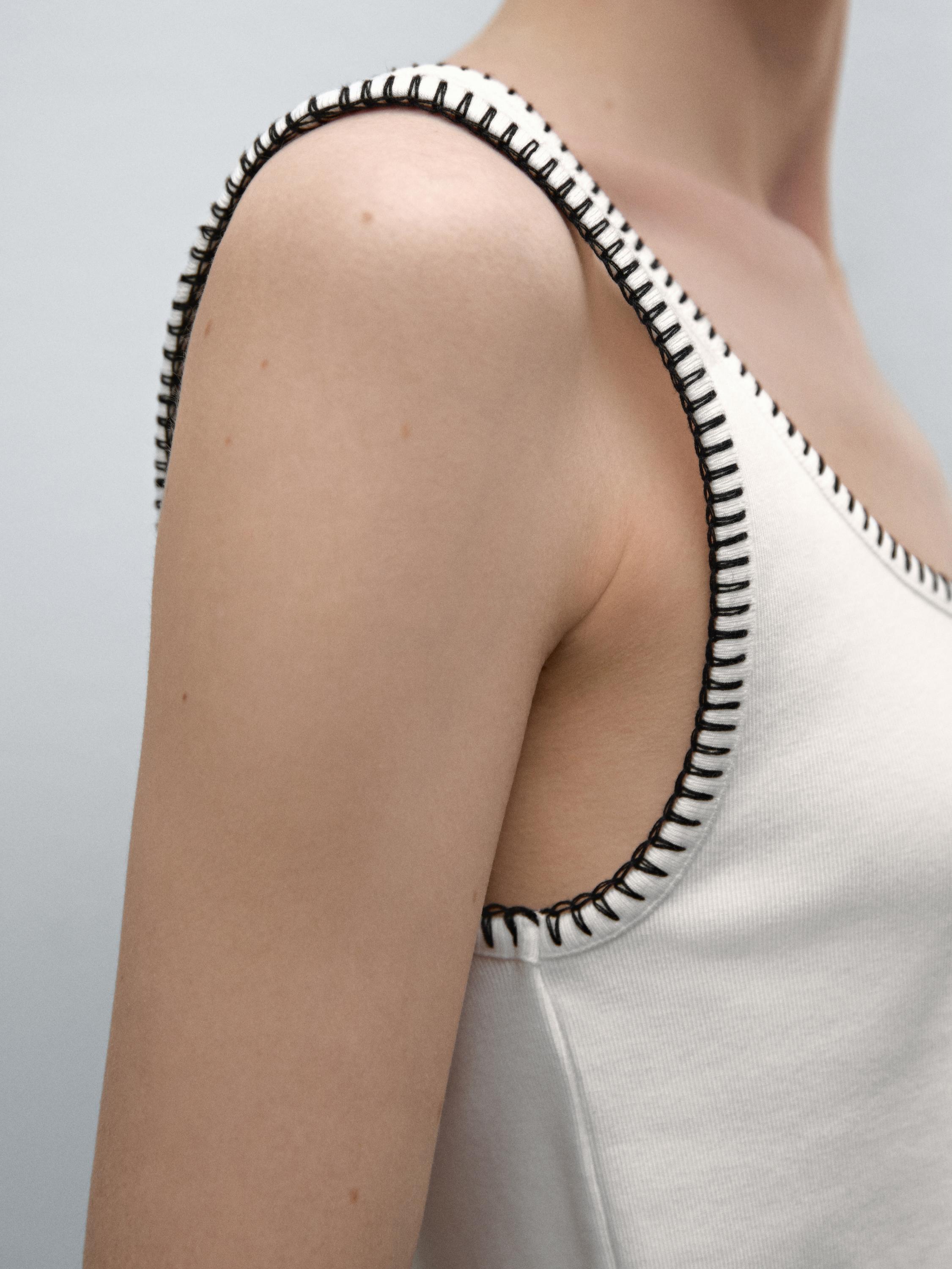Strappy top with contrast detail