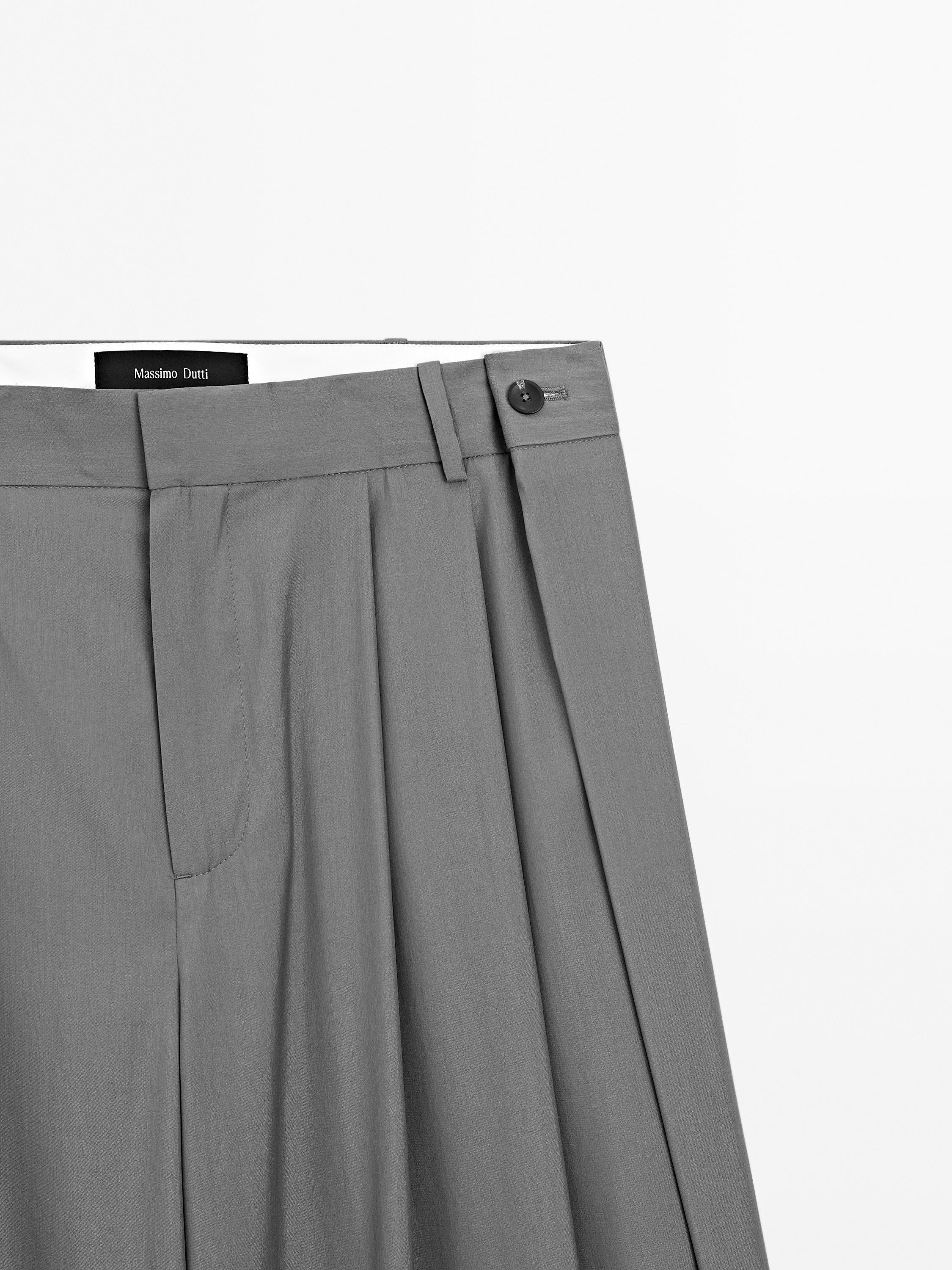 Flowing trousers with darts