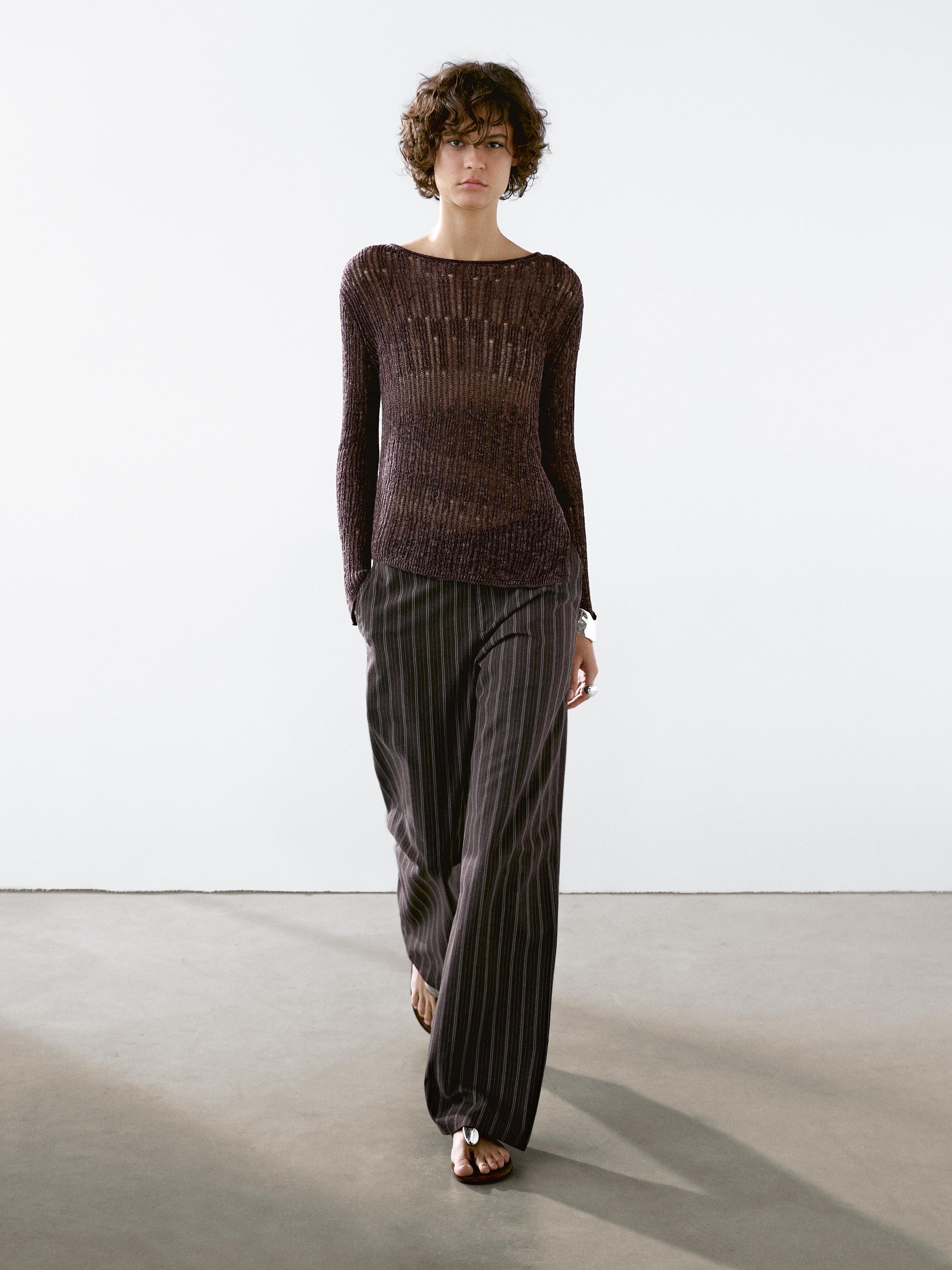 Pull en maille ajourée asymétrique